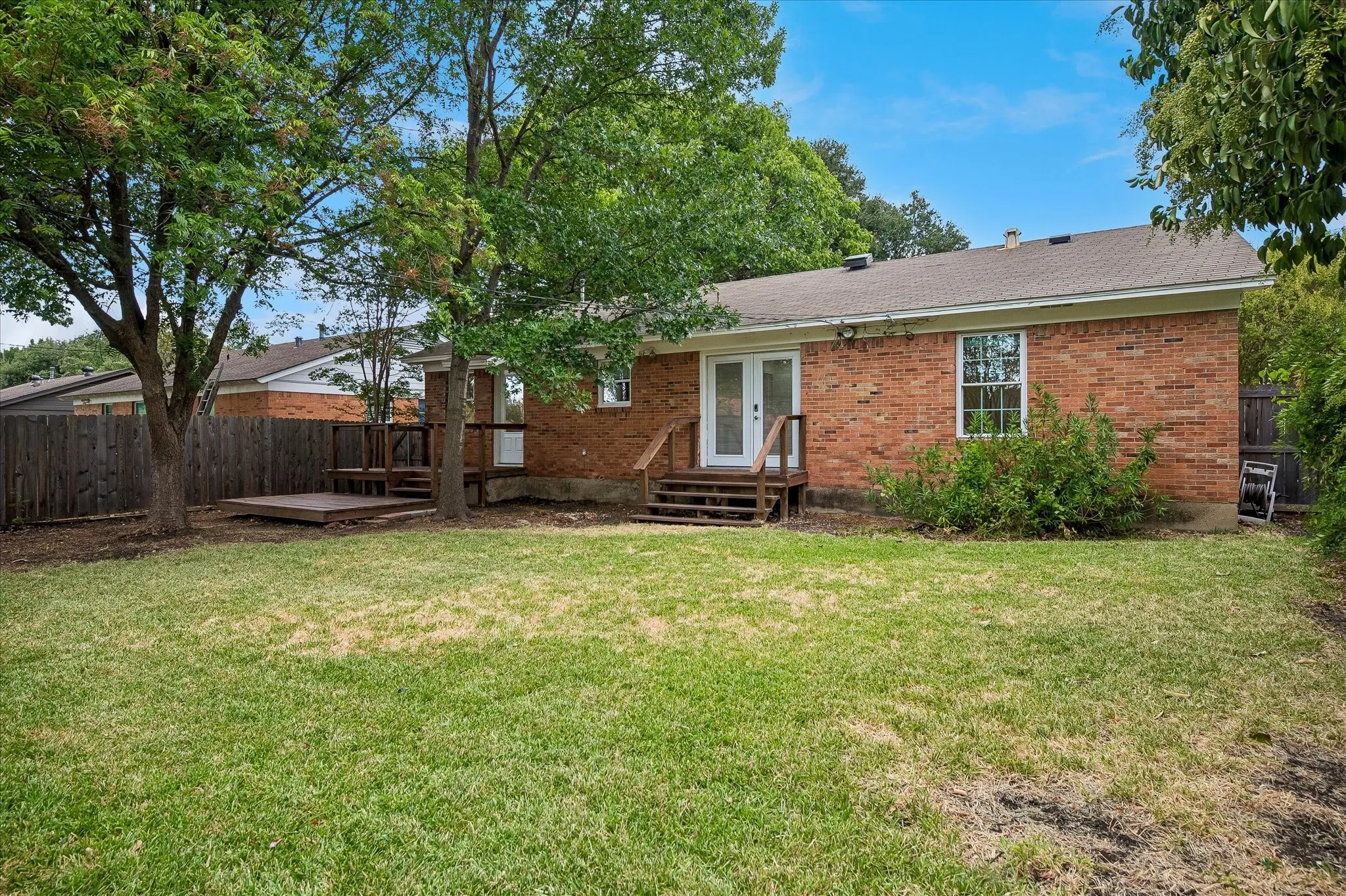 Huge back yard with plenty of room to play or let Fido run.