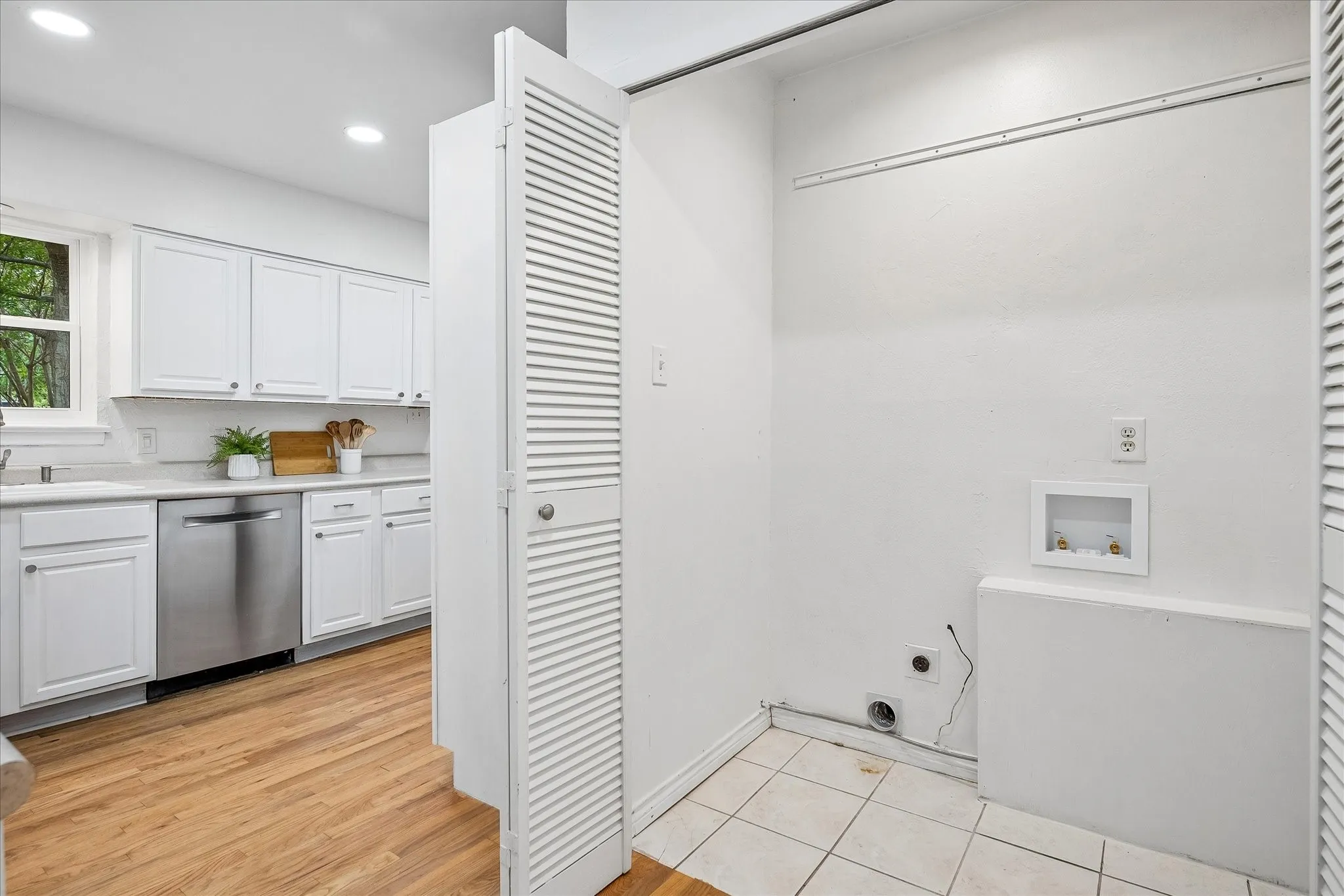 Indoor hide-away laundry closet.