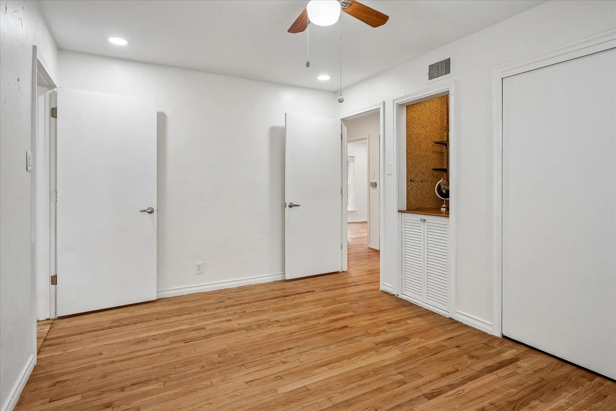 3rd bedroom with custom built-ins.