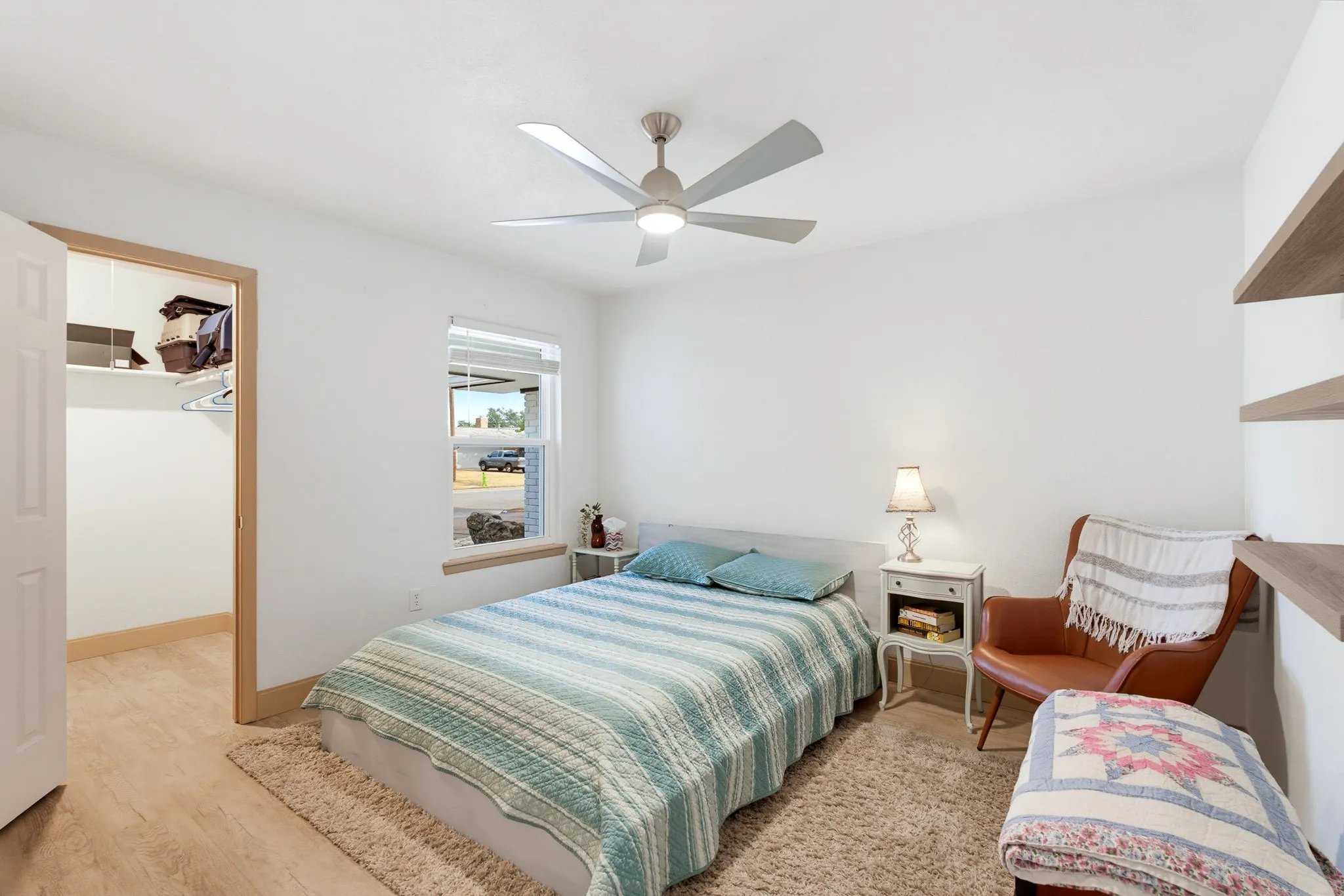 White walls with wood-finish flooring