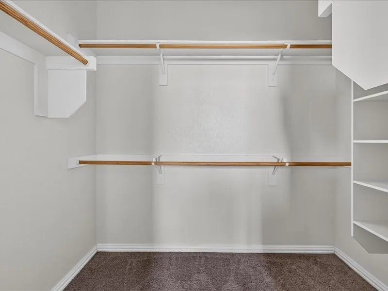 Built-in closet shelving and hanging rods