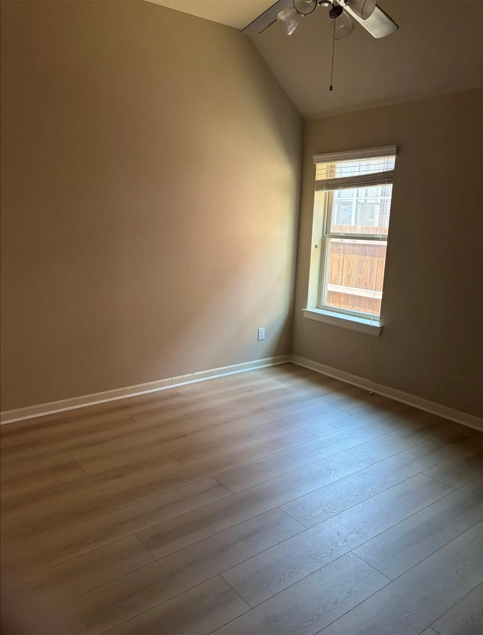 Sloped ceiling with an attached ceiling fan