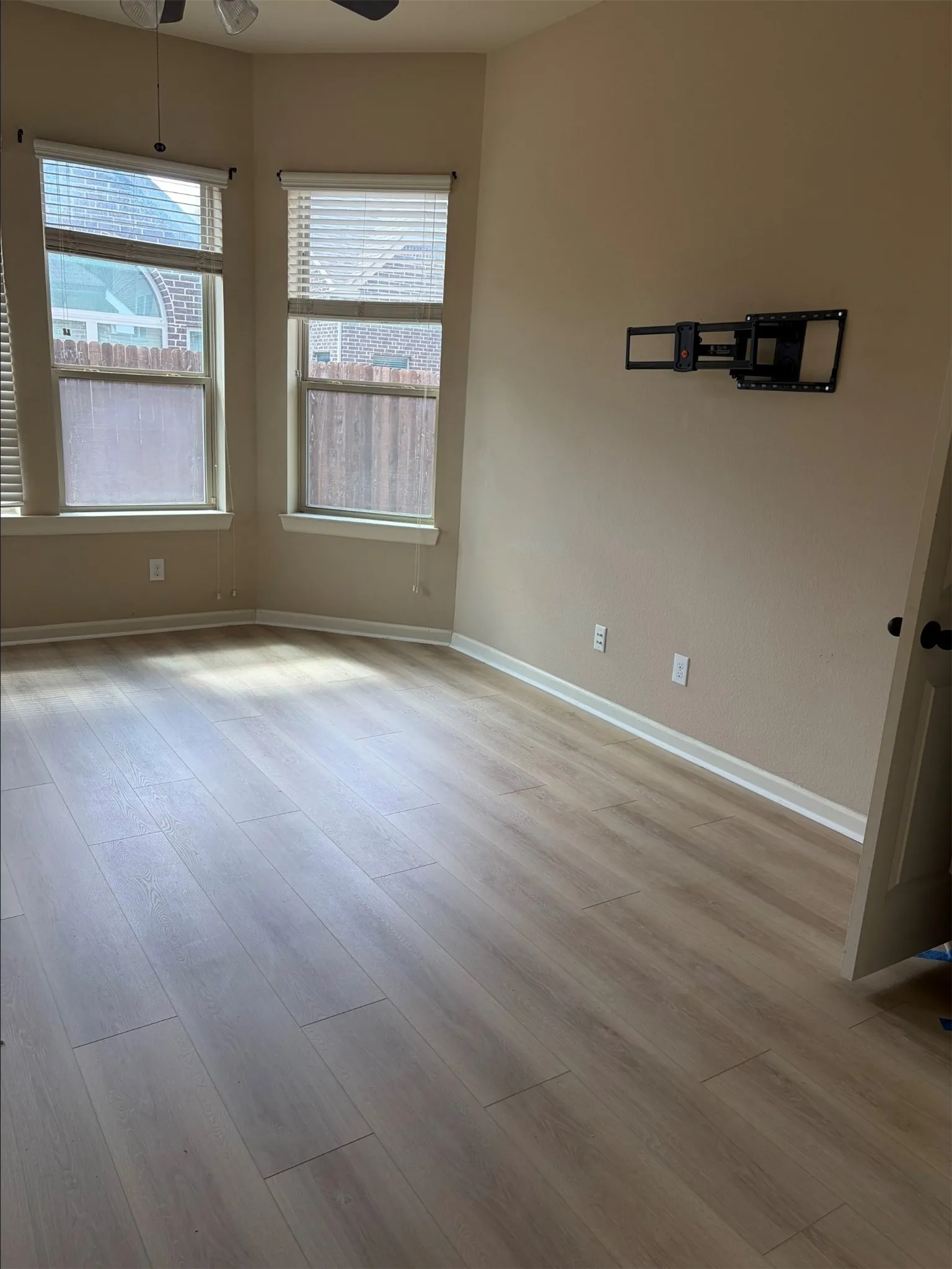 Wood-finish flooring with neutral wall tones
