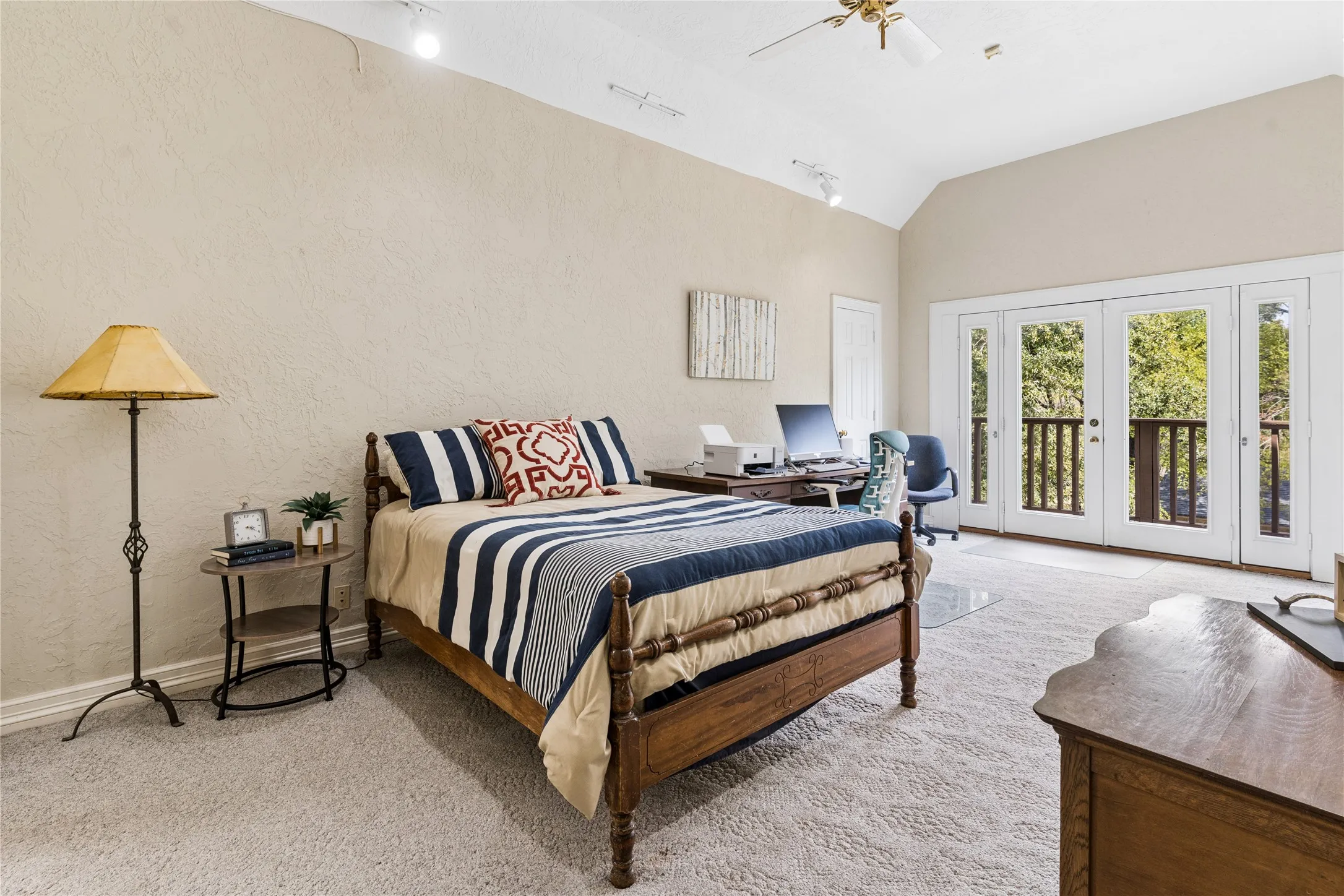Upstairs bedroom has a balcony