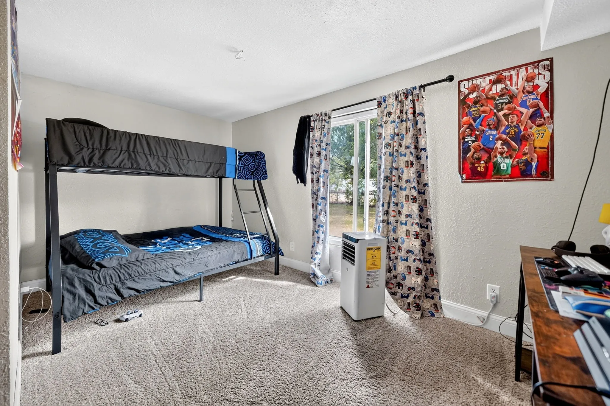 Window with natural light, wall-to-wall carpeting, painted walls, and ceiling