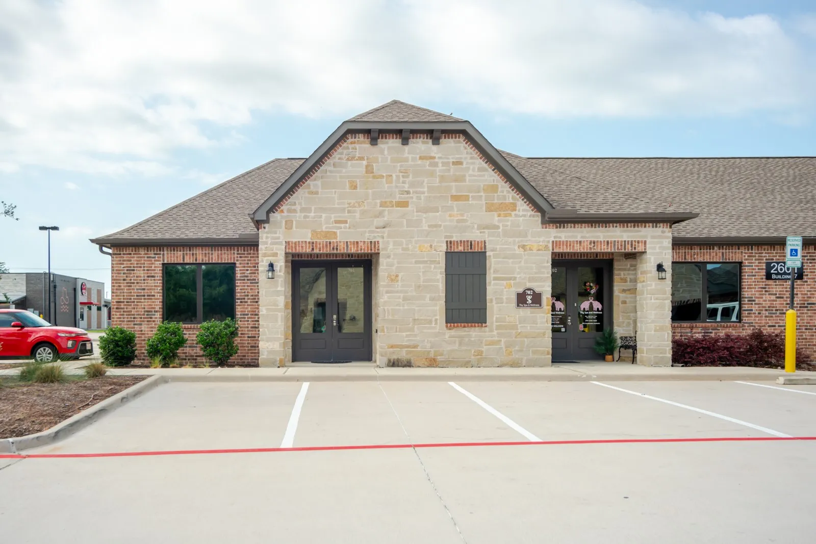 Stone and brick exterior with a gabled roof