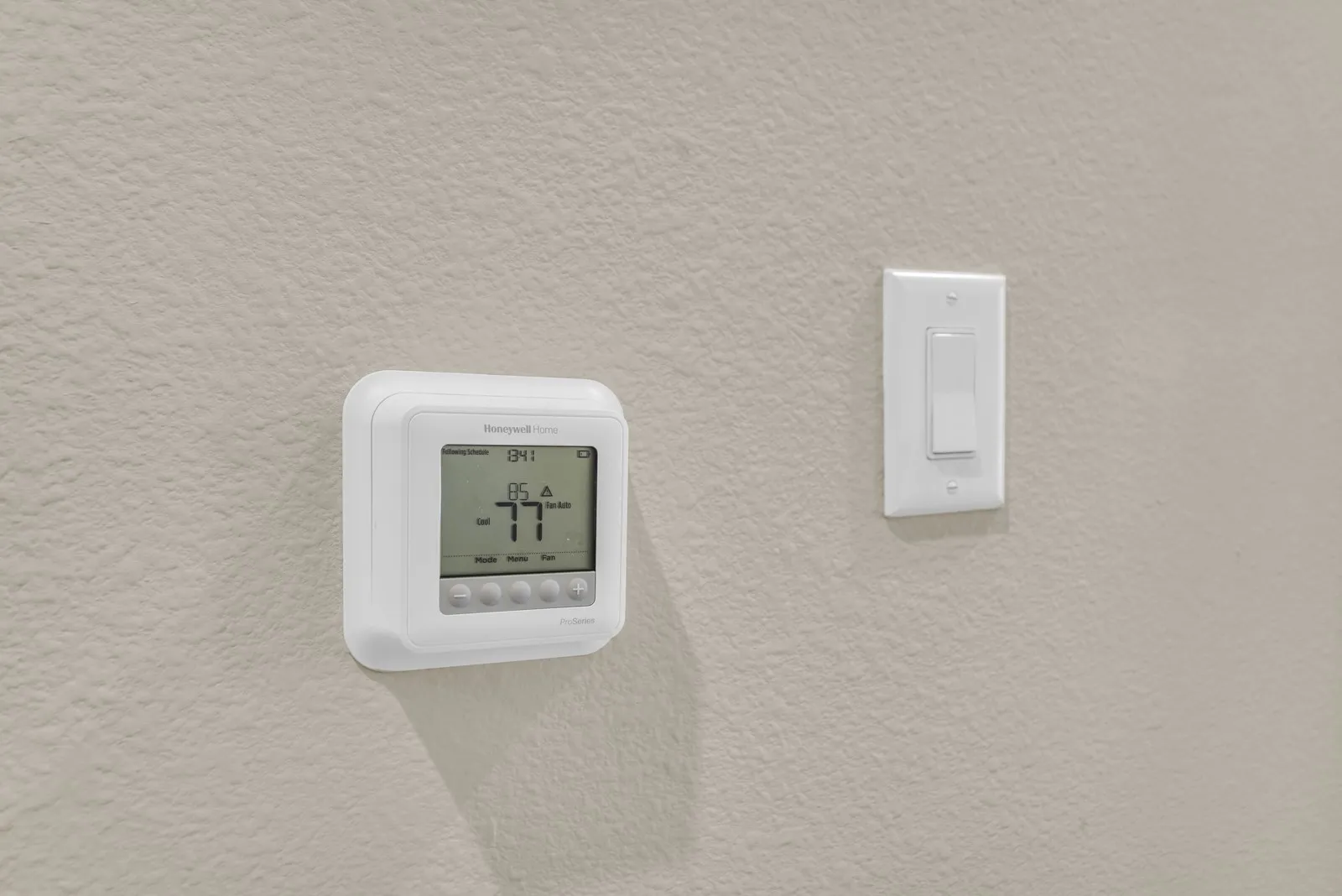 Digital thermostat with a light switch