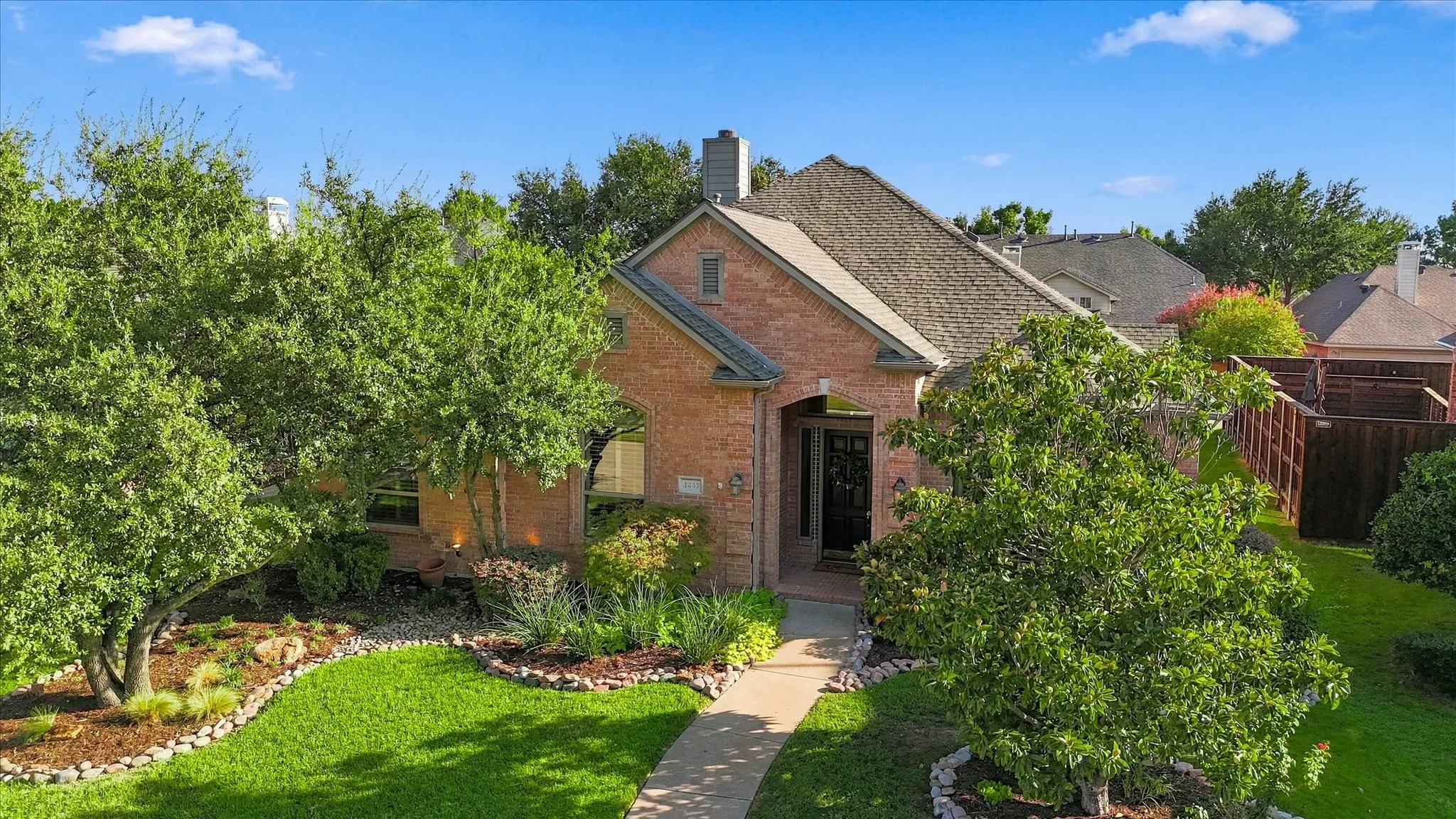 Lushly Landscaped Front Yard