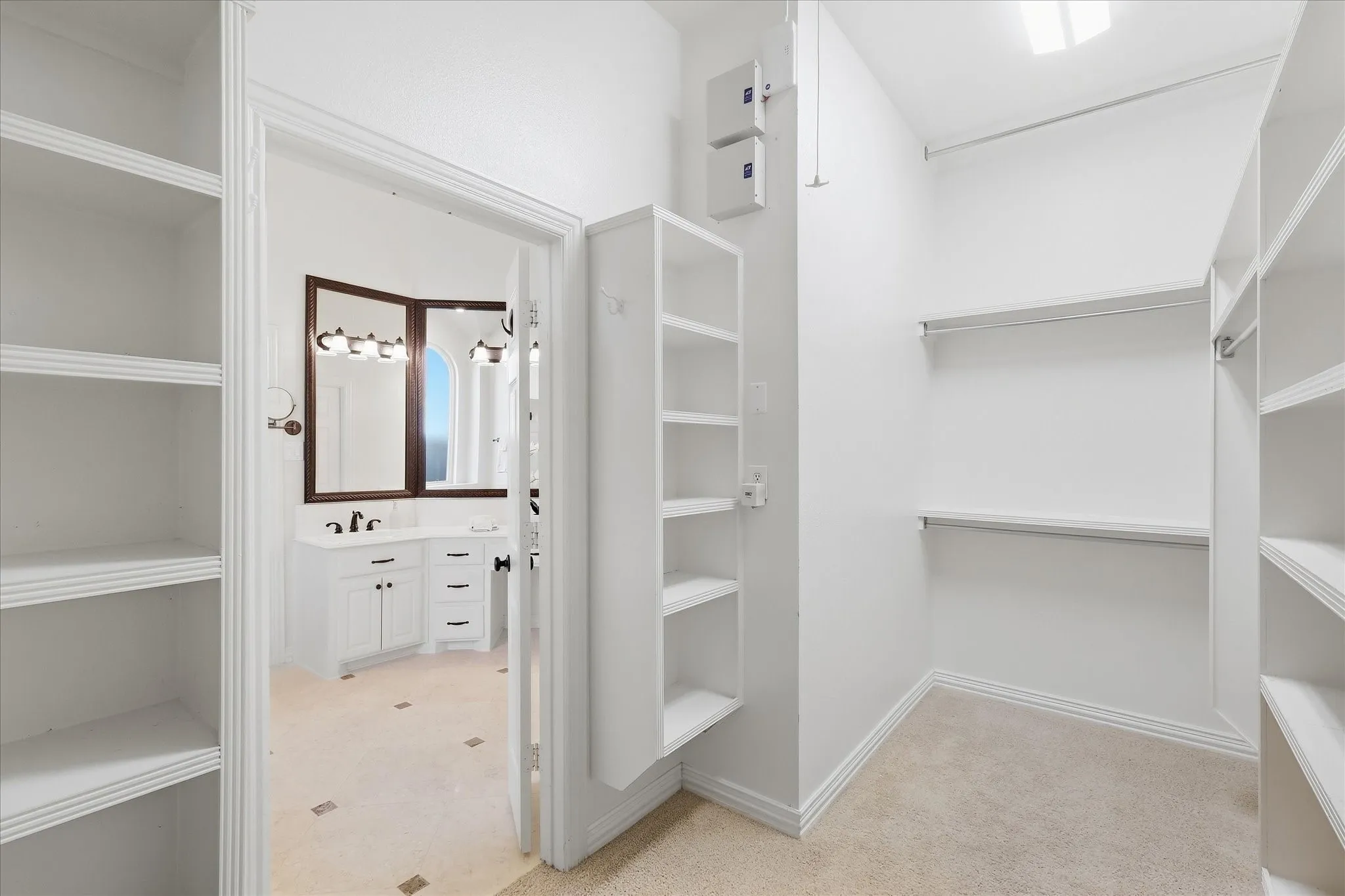 One Part of the Primary Bedroom's HUGE Closet