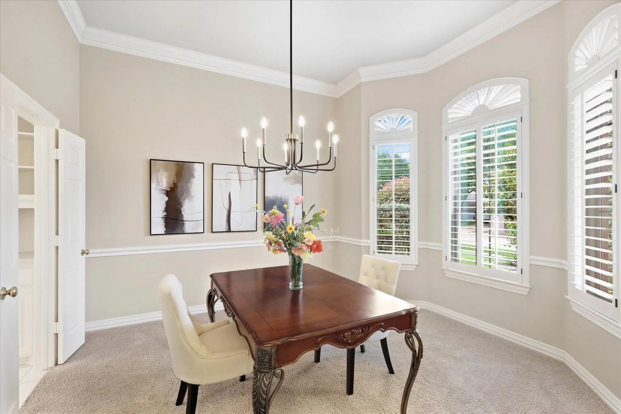 Classic Plantation Shutters Across the Front of House.
