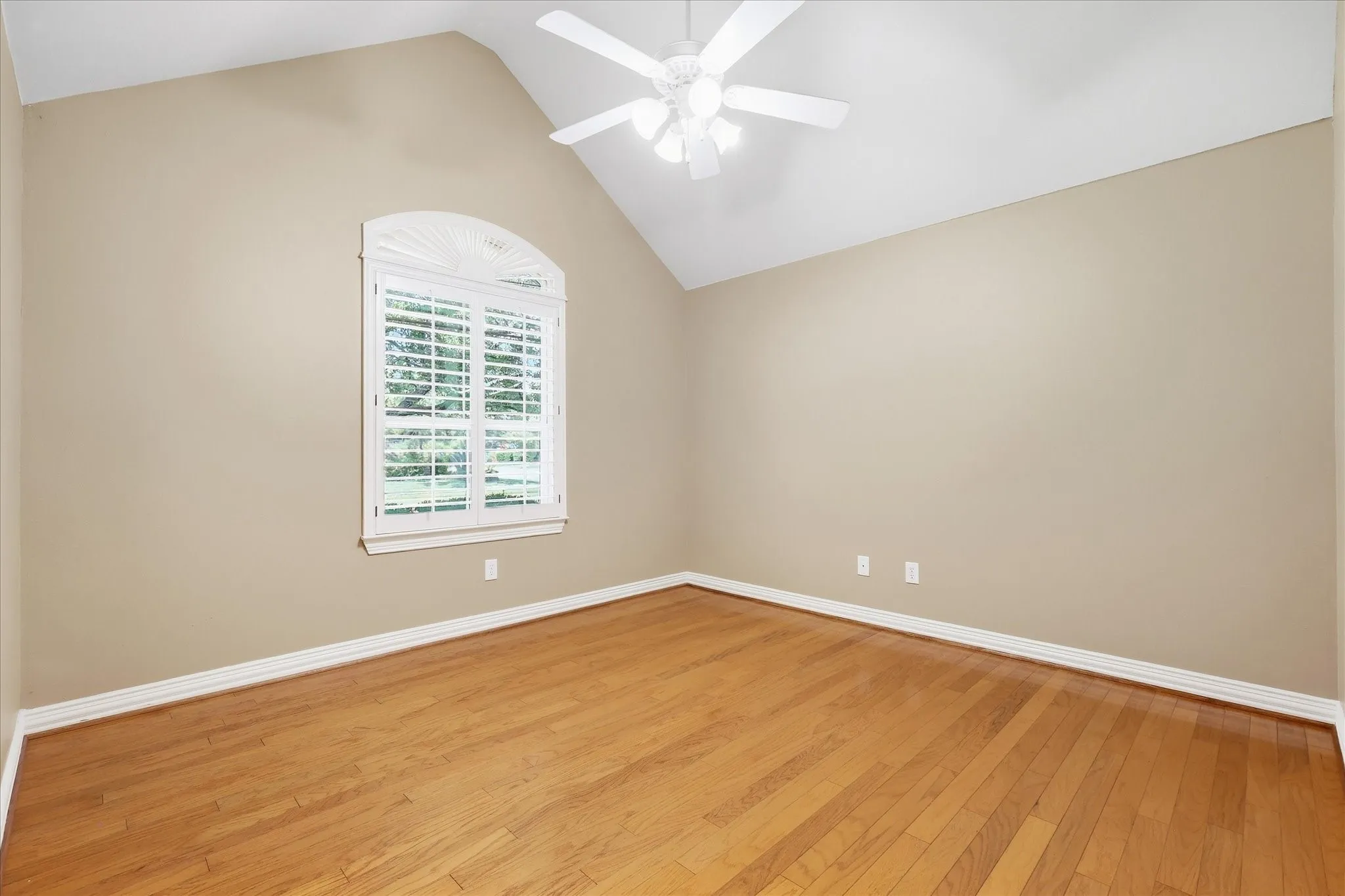 2nd Bedroom w-Wood Floors, Soaring Ceiling & Plantation Shutters