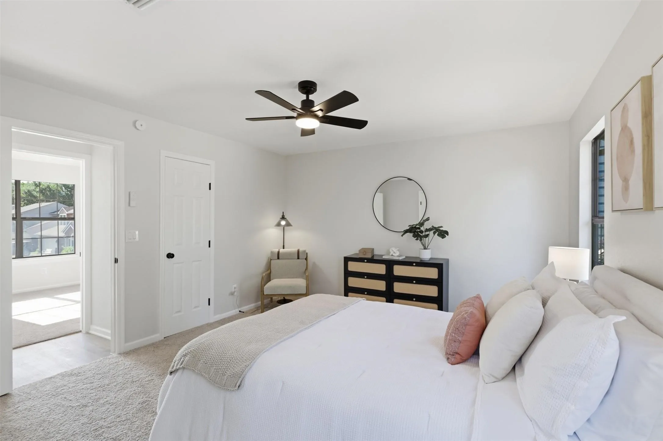 Light gray carpeted flooring paired with neutral wall tones