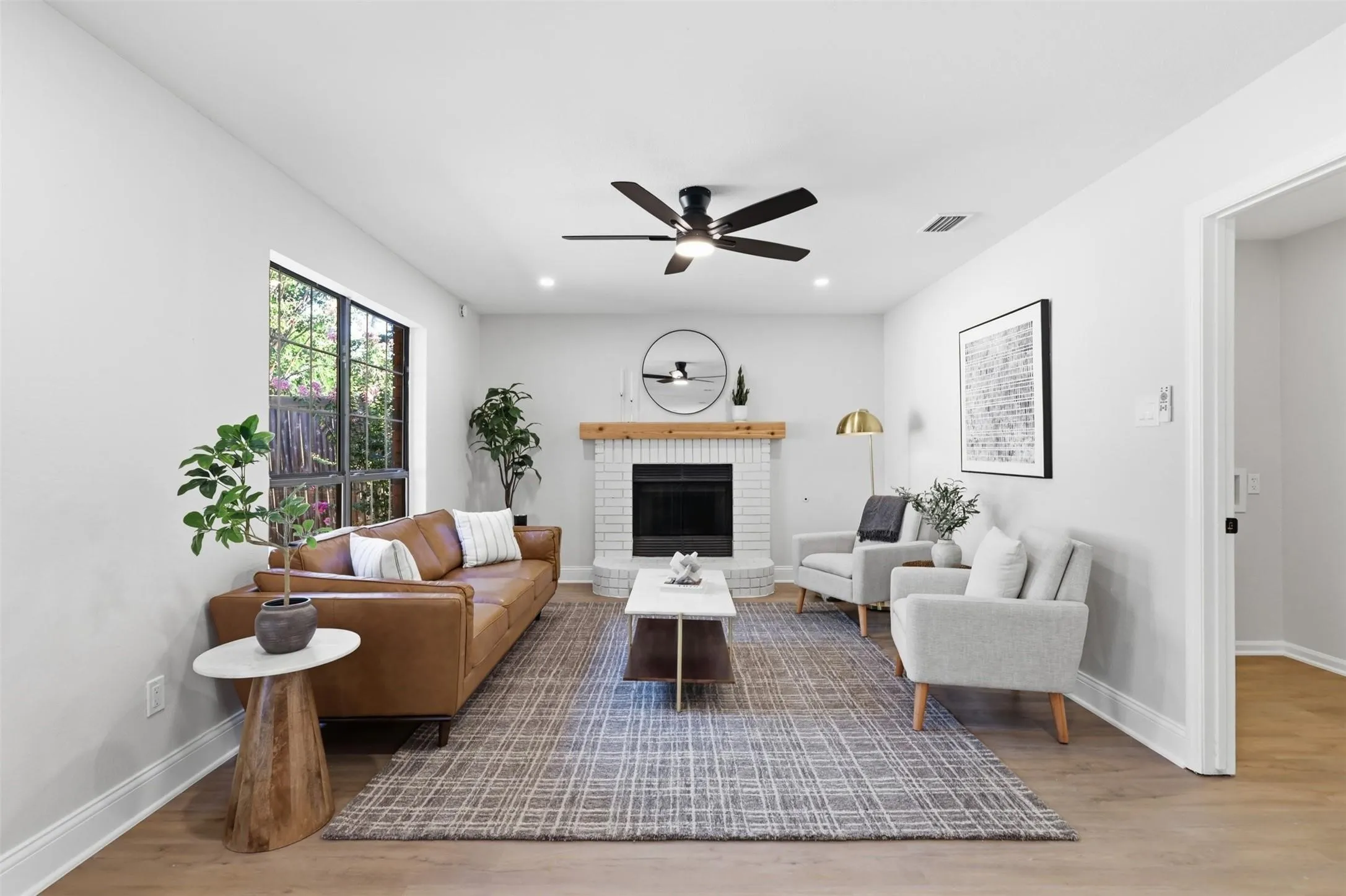Light wood-finish flooring, recessed lighting, and a ceiling fan