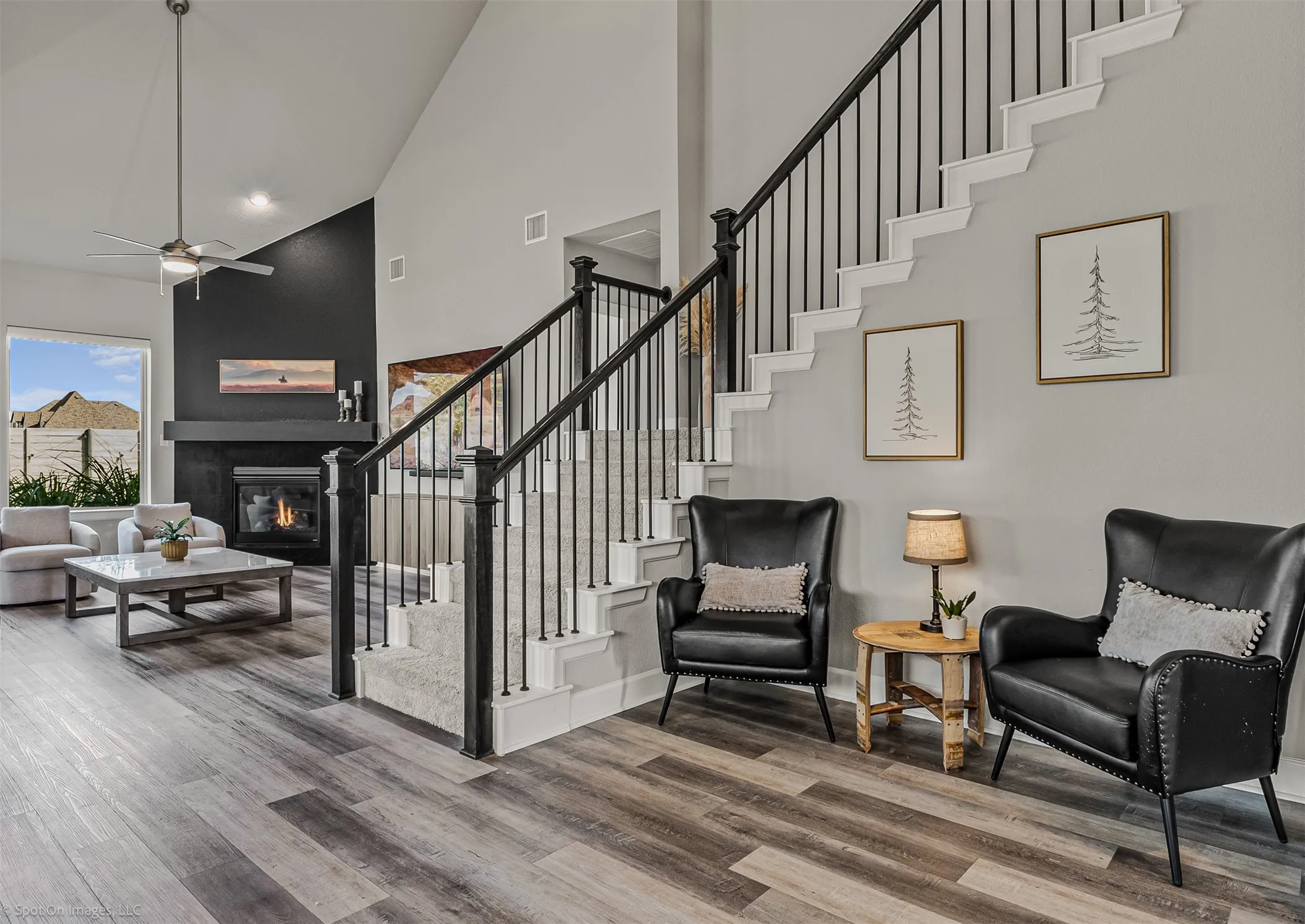 Entrance foyer with stairs and view of living room of 1302 20th St, Argyle, TX in Harvest by Hillwood