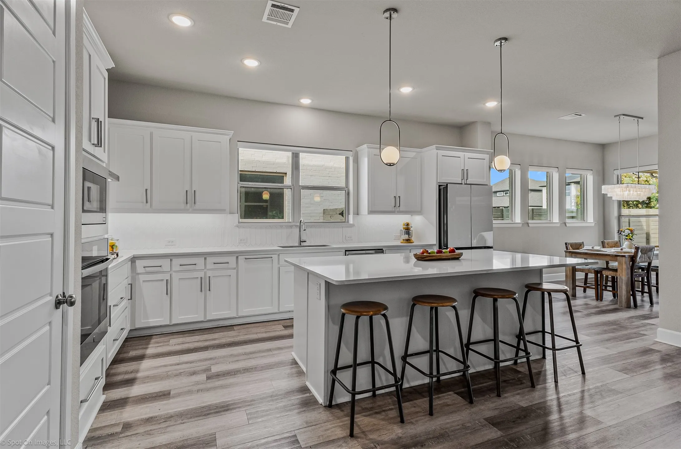 Large kitchen with kitchen island of 1302 20th St, Argyle, TX in Harvest by Hillwood