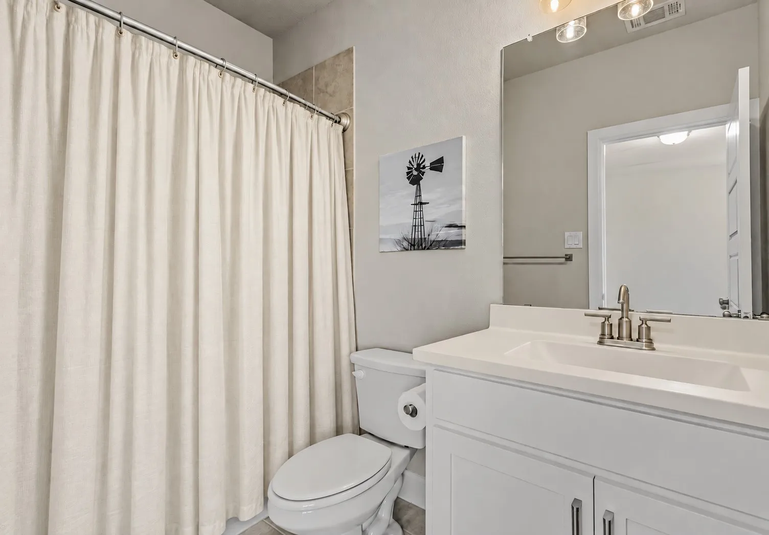 Upstairs full bathroom of 1302 20th St, Argyle, TX in Harvest by Hillwood