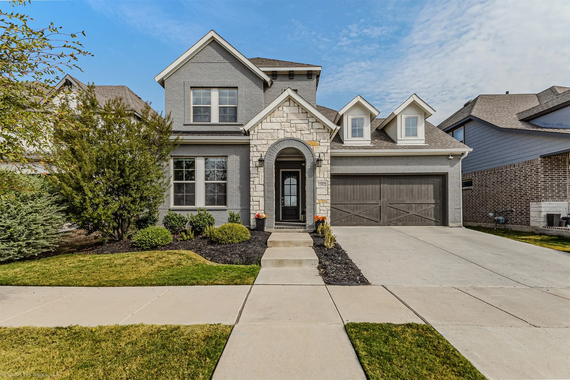 Front of the home of 1302 20th St, Argyle, TX in Harvest by Hillwood