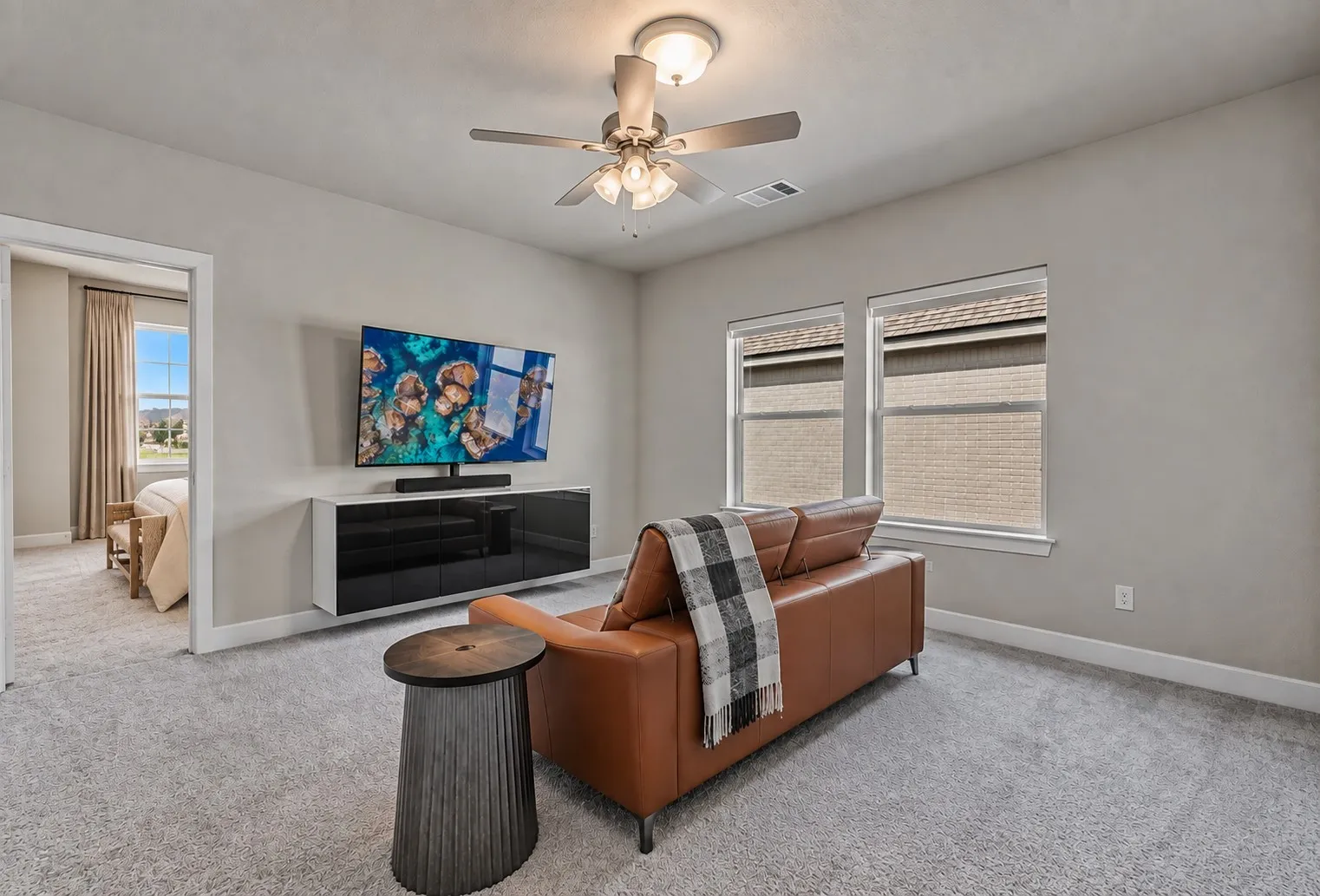 Upstairs open loft space of 1302 20th St, Argyle, TX in Harvest by Hillwood. Virtually staged