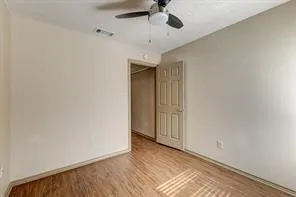 Wood-finish flooring with neutral wall tones