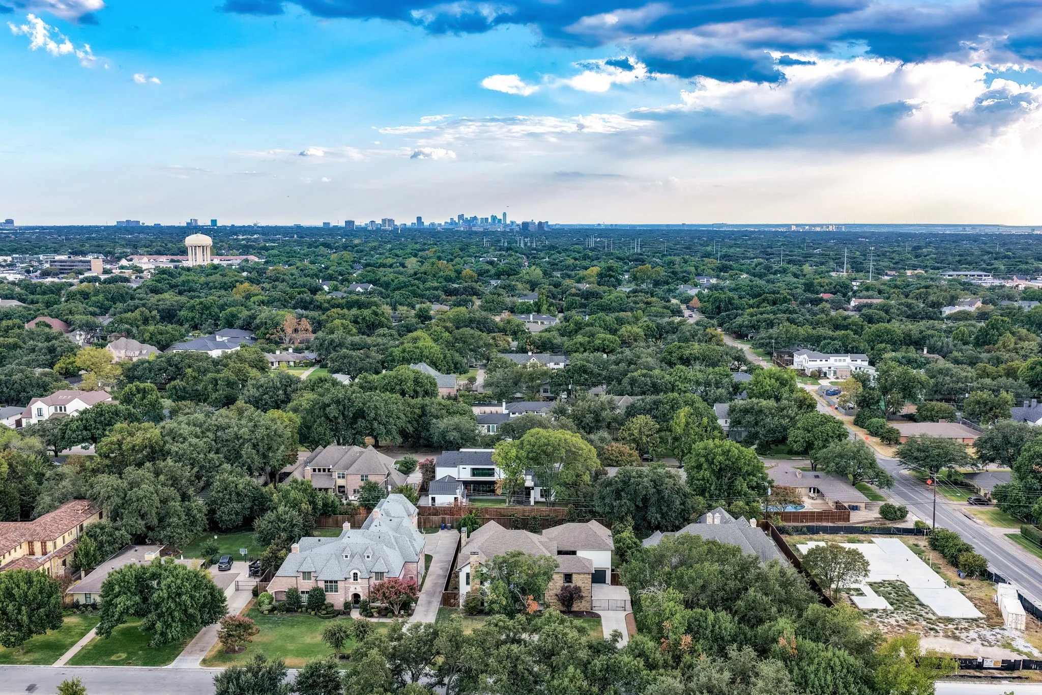 Expansive residential area featuring numerous mature trees and diverse architectural styles