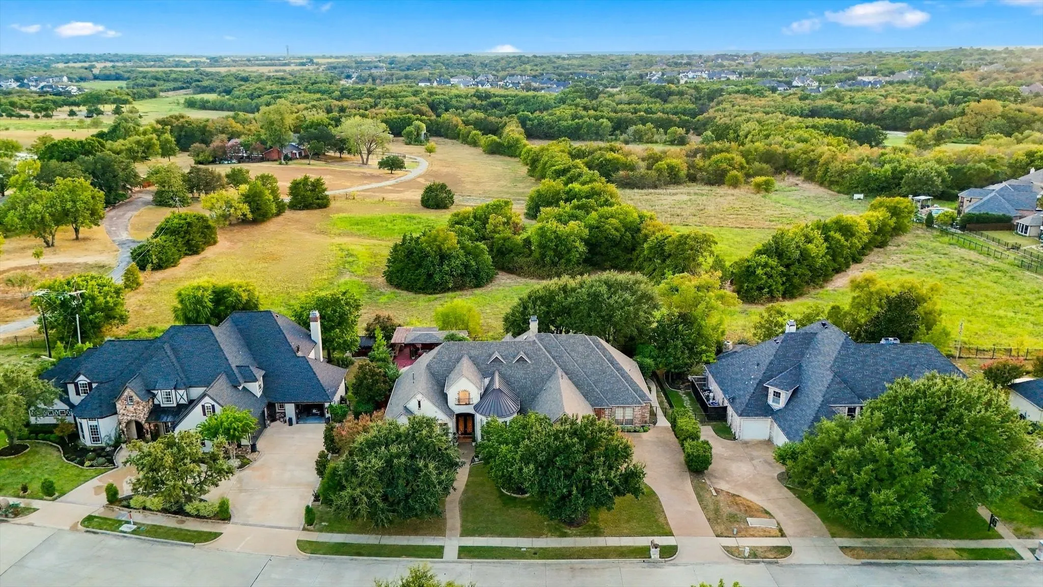 Timeless beauty in a sought-after neighborhood, surrounded by stately homes and positioned on a prime lot backing to a greenspace that will never be built on.