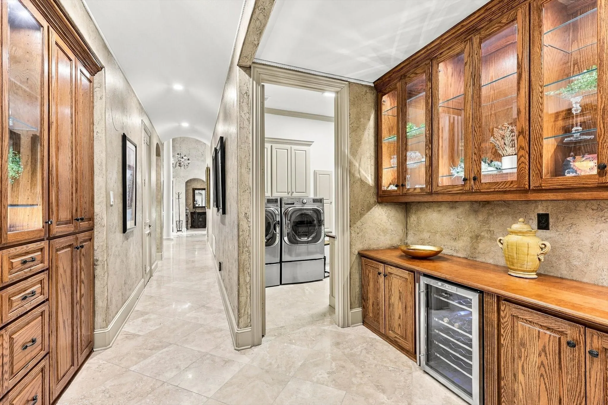 One of the home's standout features is its abundance of storage. Built-in cabinetry, walk-in pantries and thoughtful storage solutions throughout make it easy to keep everything organized and within reach.