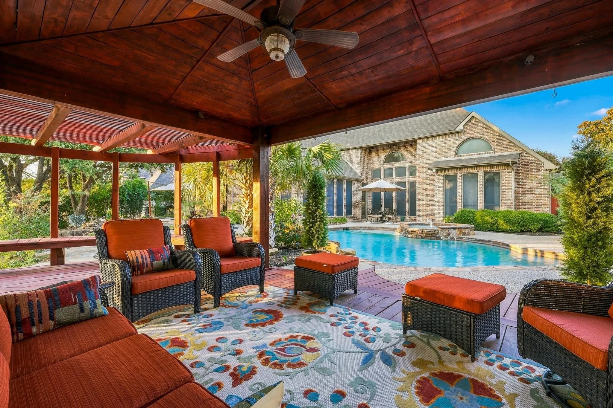 Bring everyone together under this oversized pergola, complete with built-in counters, grill and outdoor kitchen. With room to entertain a crowd, dine and relax in the shade, it truly extends the living space outdoors.