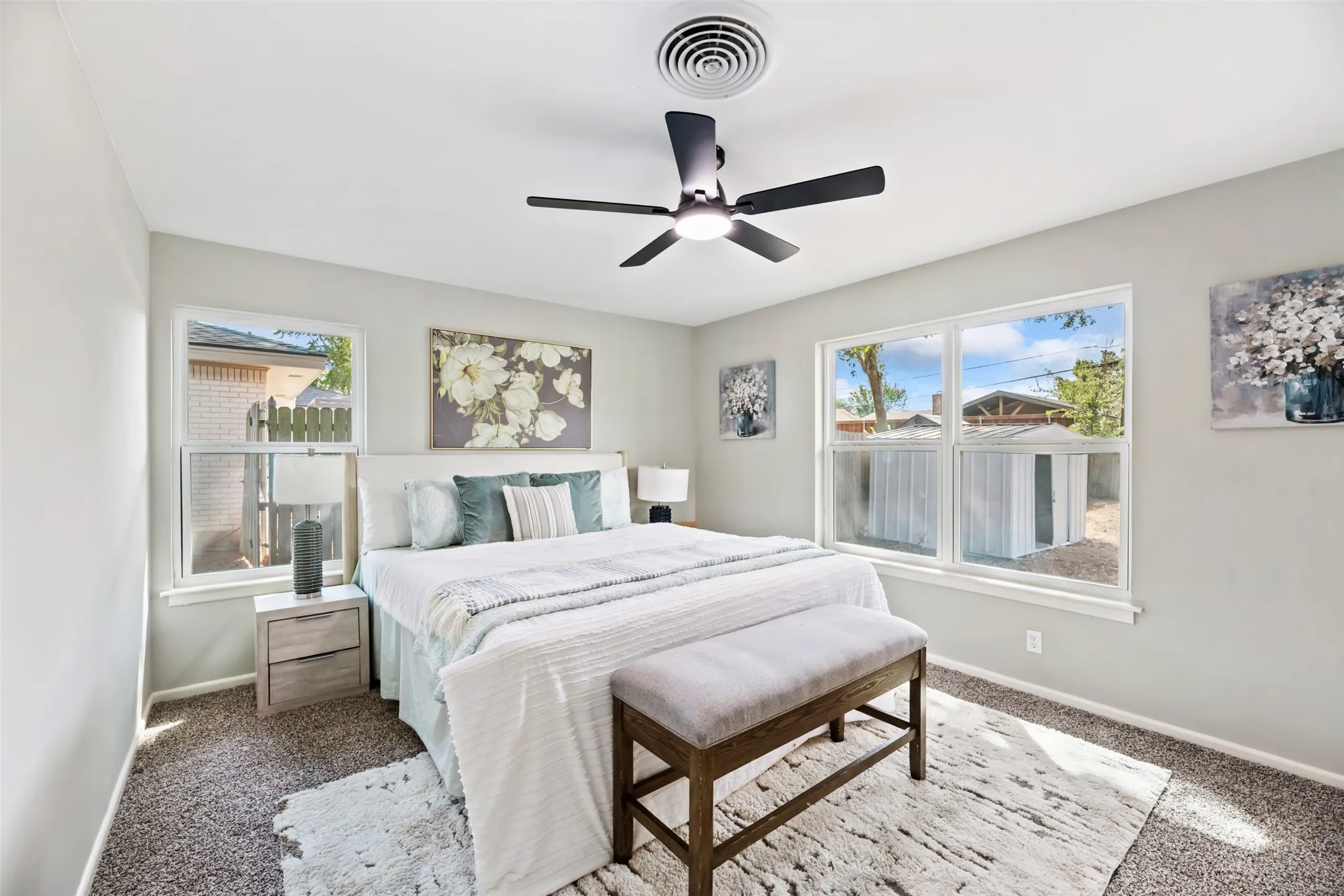 Primary Bedroom.  All bedrooms have new carpet and celing fans