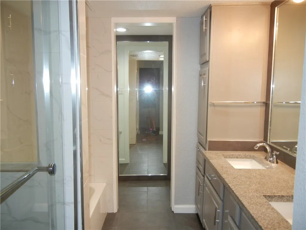 Master Bathroom, Separate Shower & tub, Porcelin Flooring, Great Lighting. Full Length mirror, Granite counter w/ Double Undermount sinks