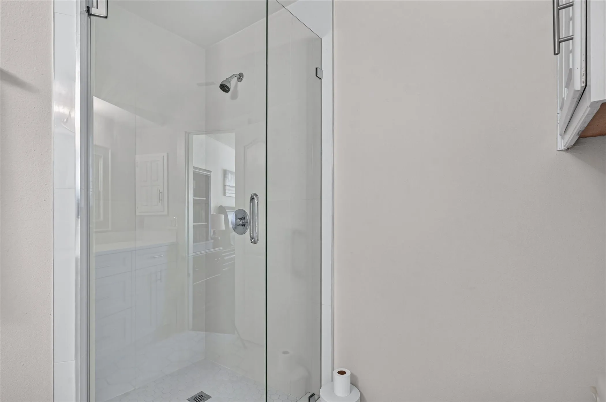 Large walk in shower in primary bathroom