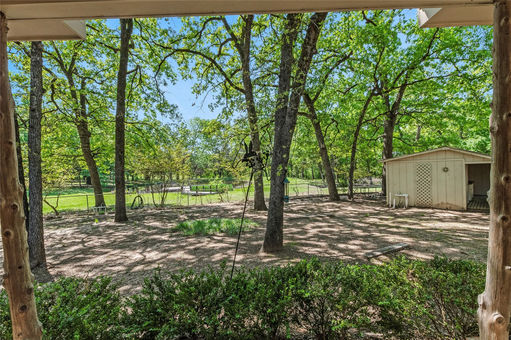 Fenced backyard, view from back patio of main home