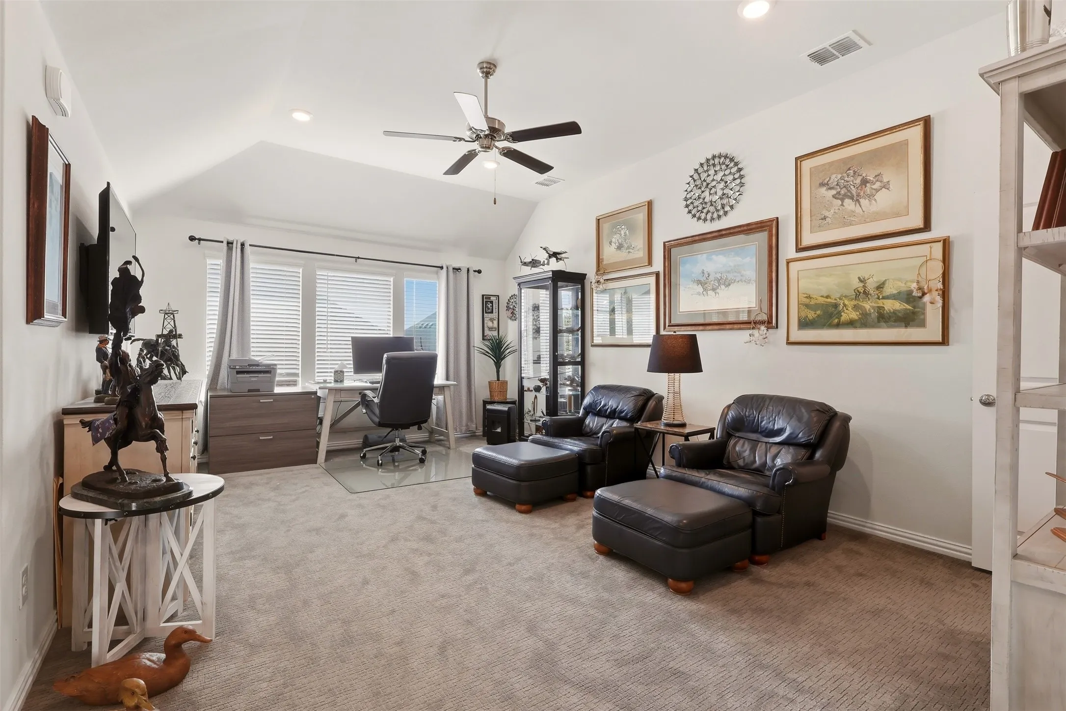 Vaulted ceiling with a ceiling fan, recessed lighting, and a window with blinds