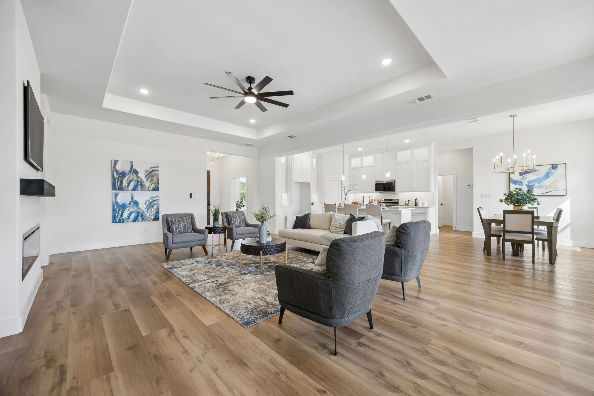 Another view of the open-concept living area looking towards the front of the home