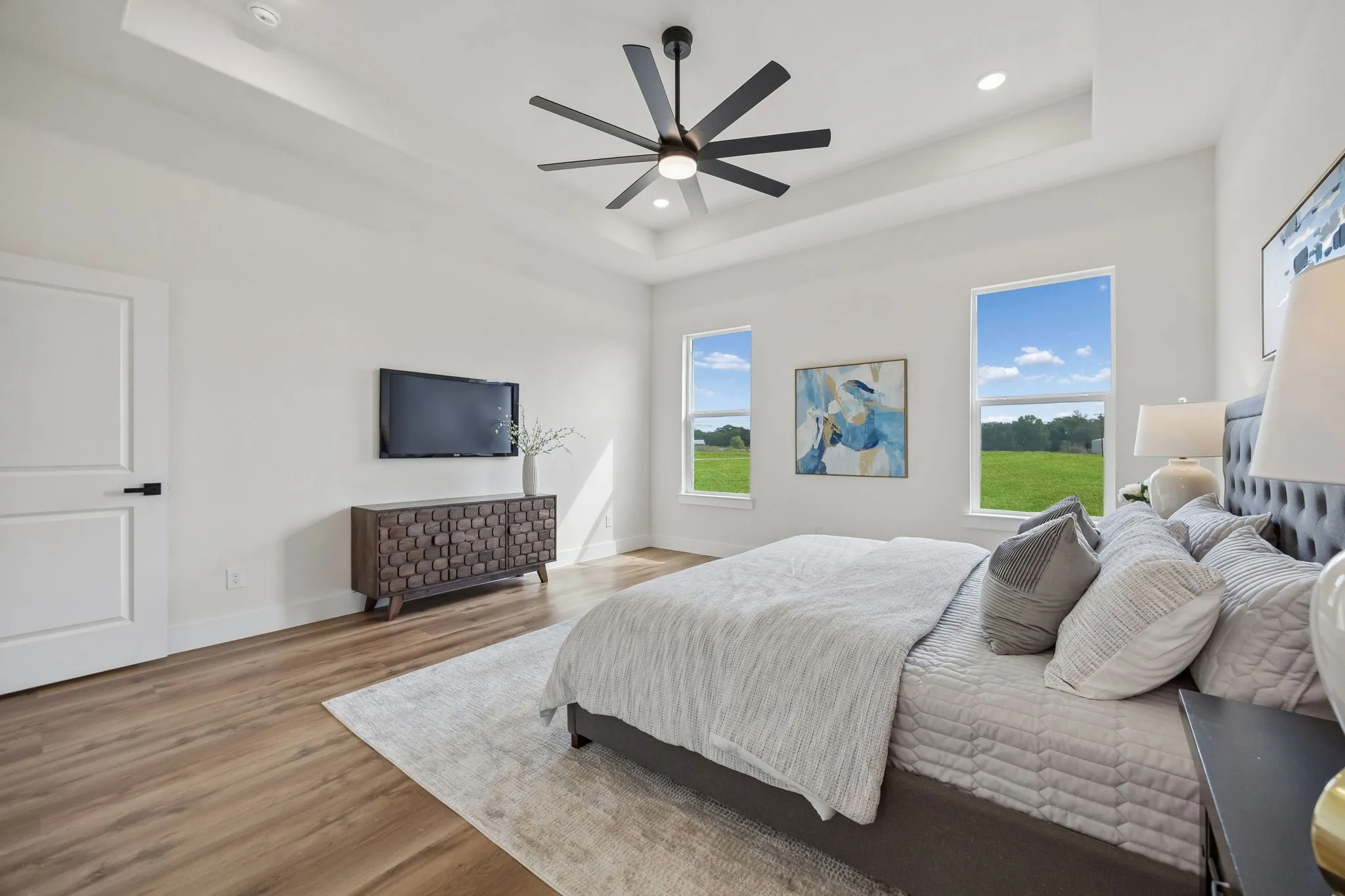 Great natural light and views from the primary bedroom