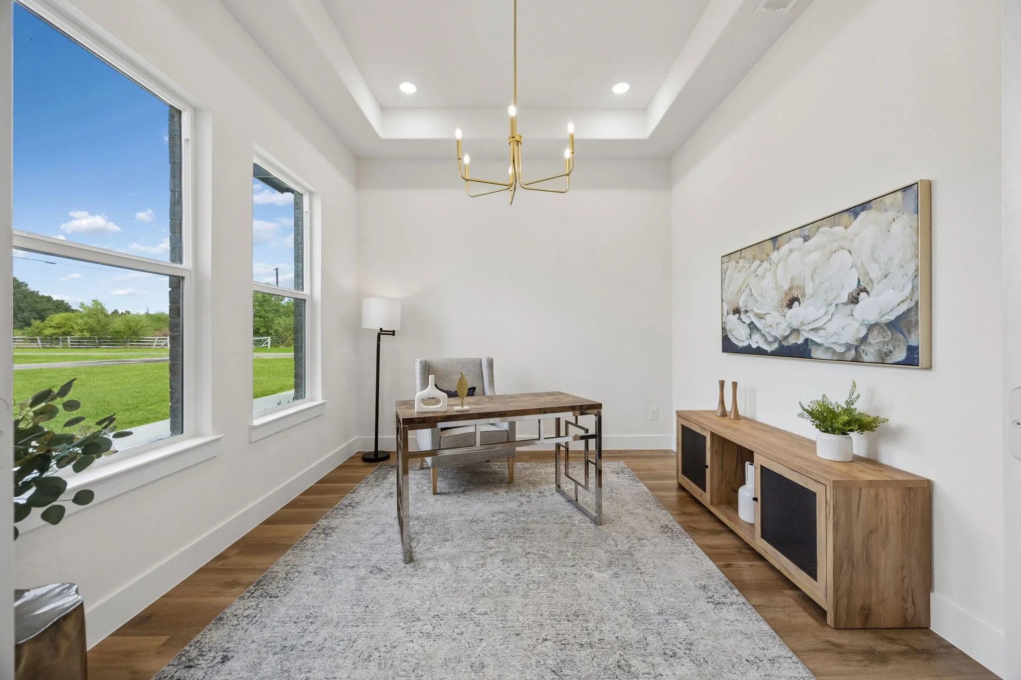 Dedicated home office with a trayed ceiling