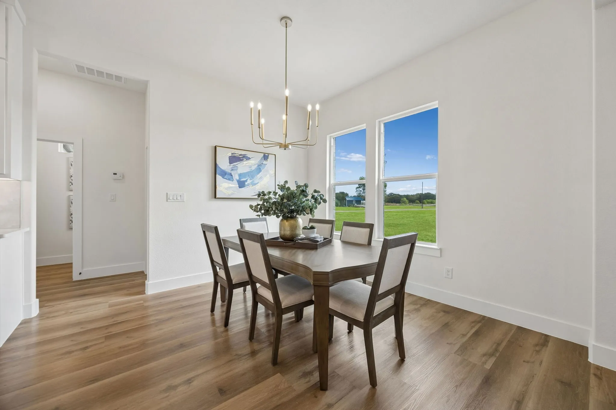 Dining area with a chandelier and great natural light