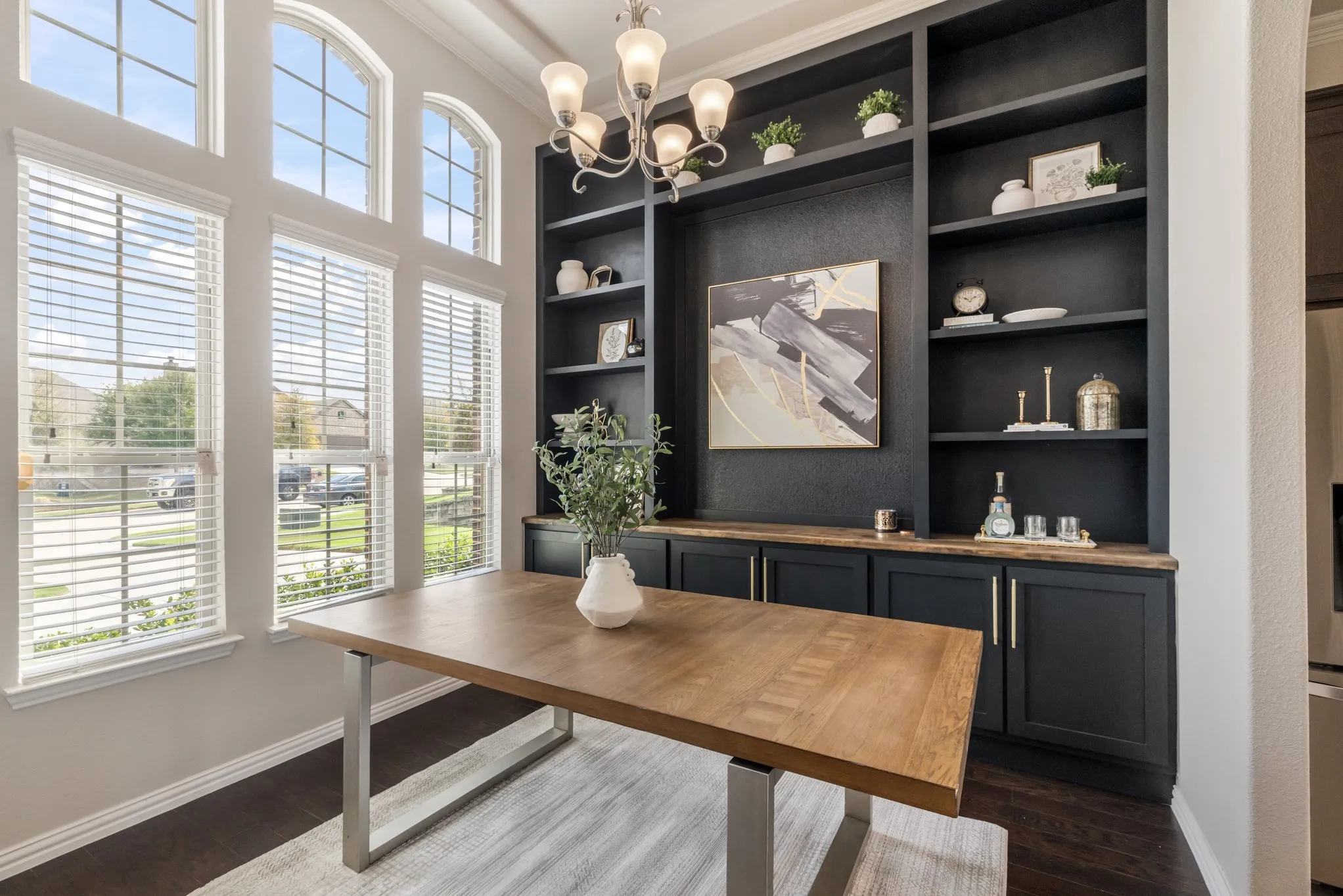 Built-in shelving and cabinetry with wood-finish countertops