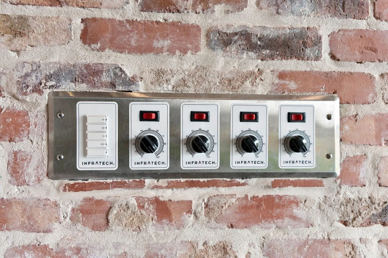 Brick wall texture with a stainless steel control panel