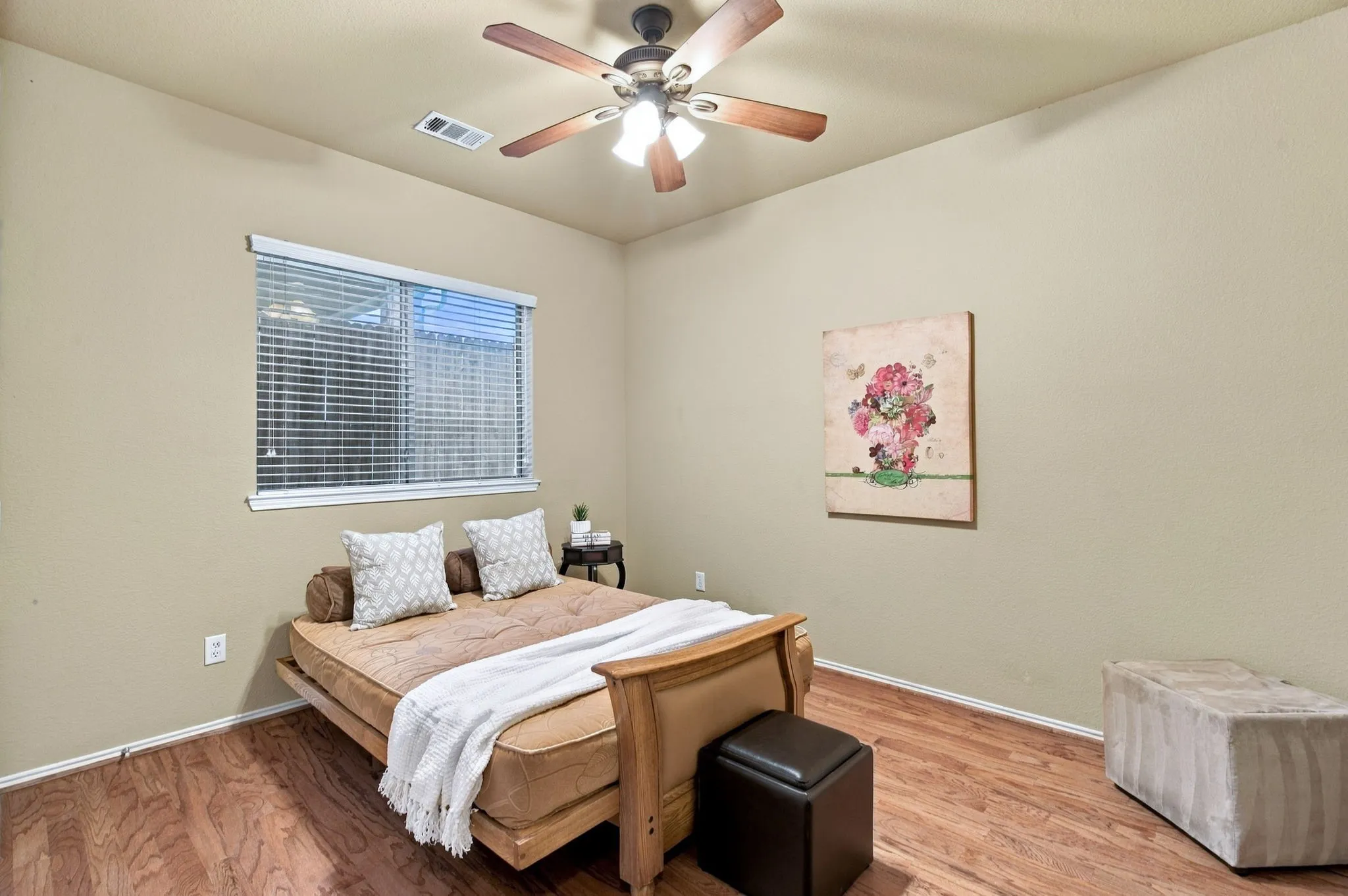 3rd Bedroom downstairs with hardwood flooring