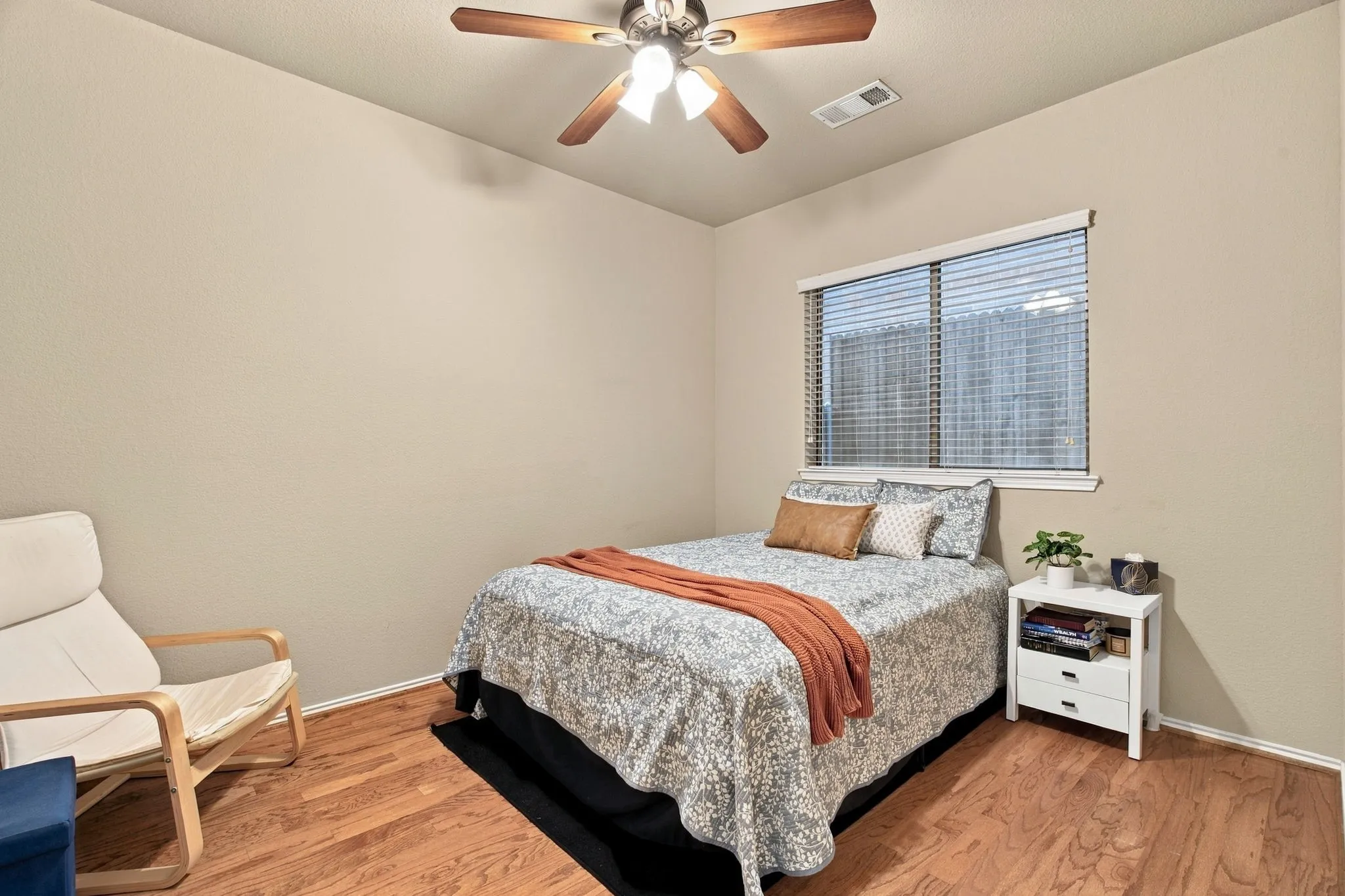 2nd Bedroom downstairs with hardwood flooring