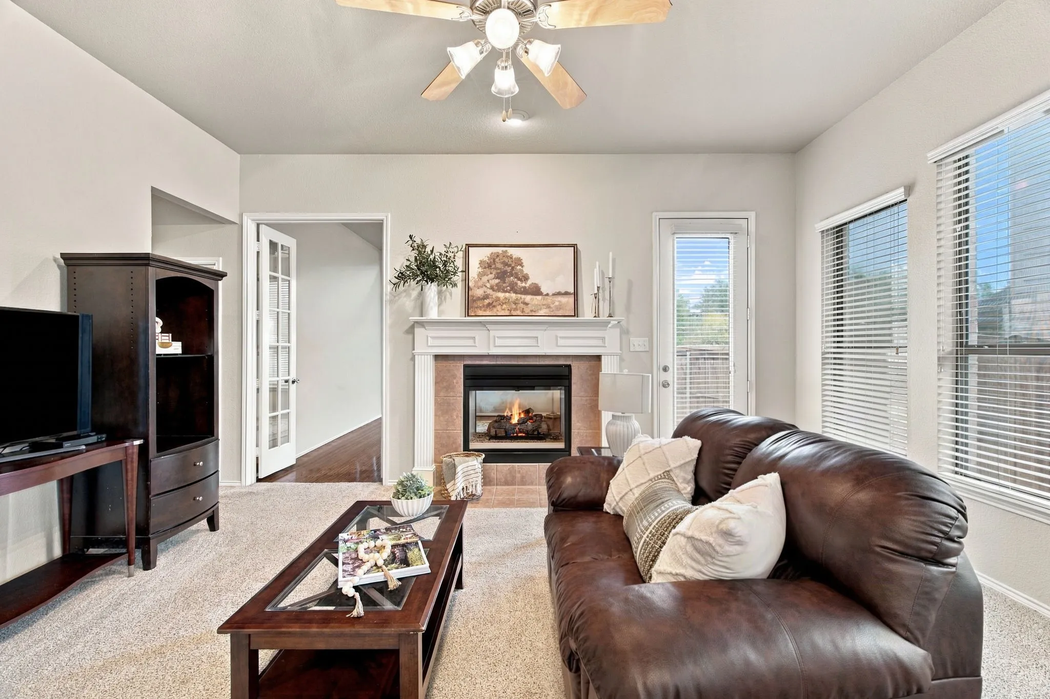 Large windows along the wall and a nice glass patio door for extra light.