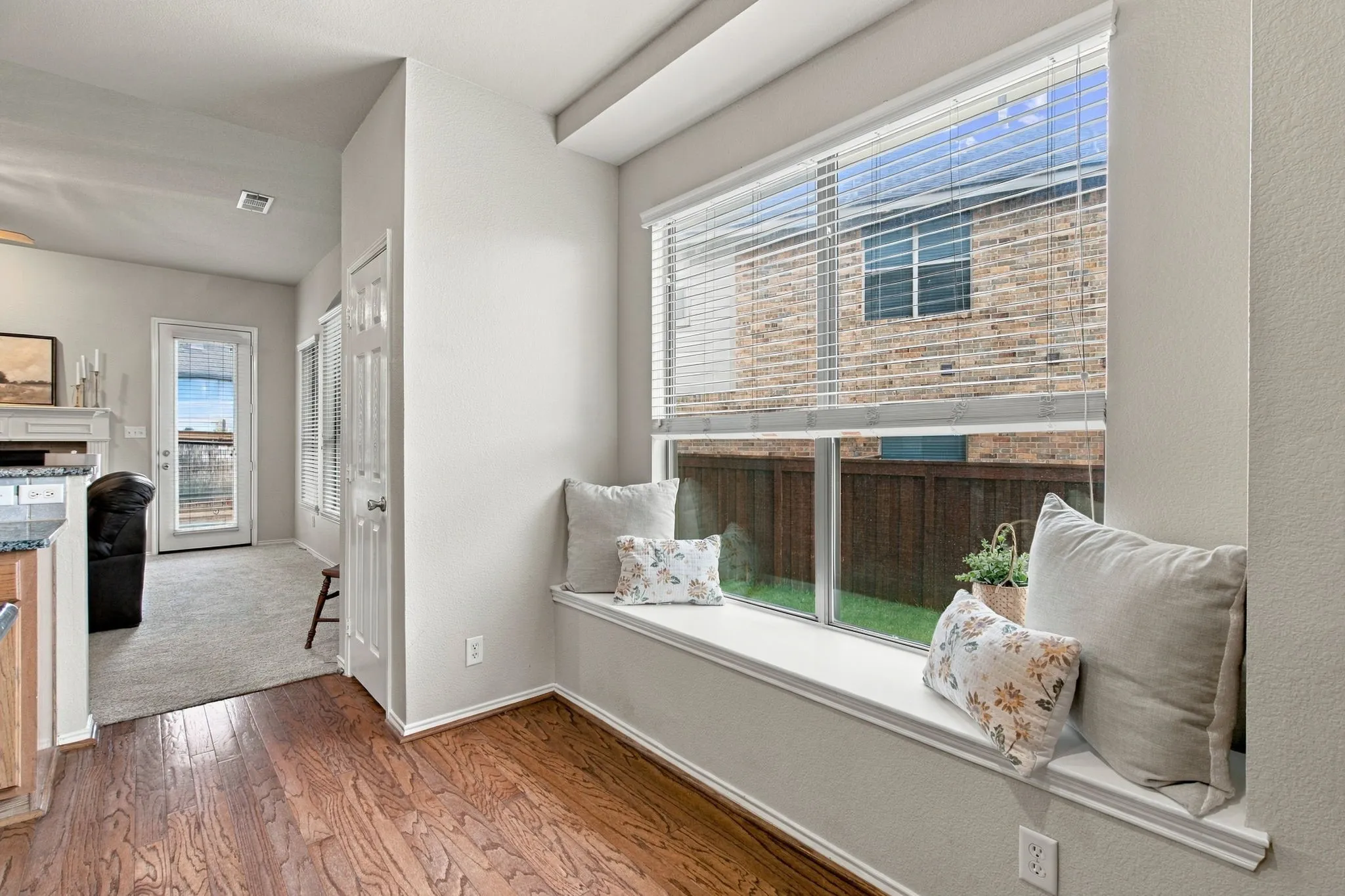 Cozy built in bench in the kitchen. You can add a table for an extra breakfast nook.