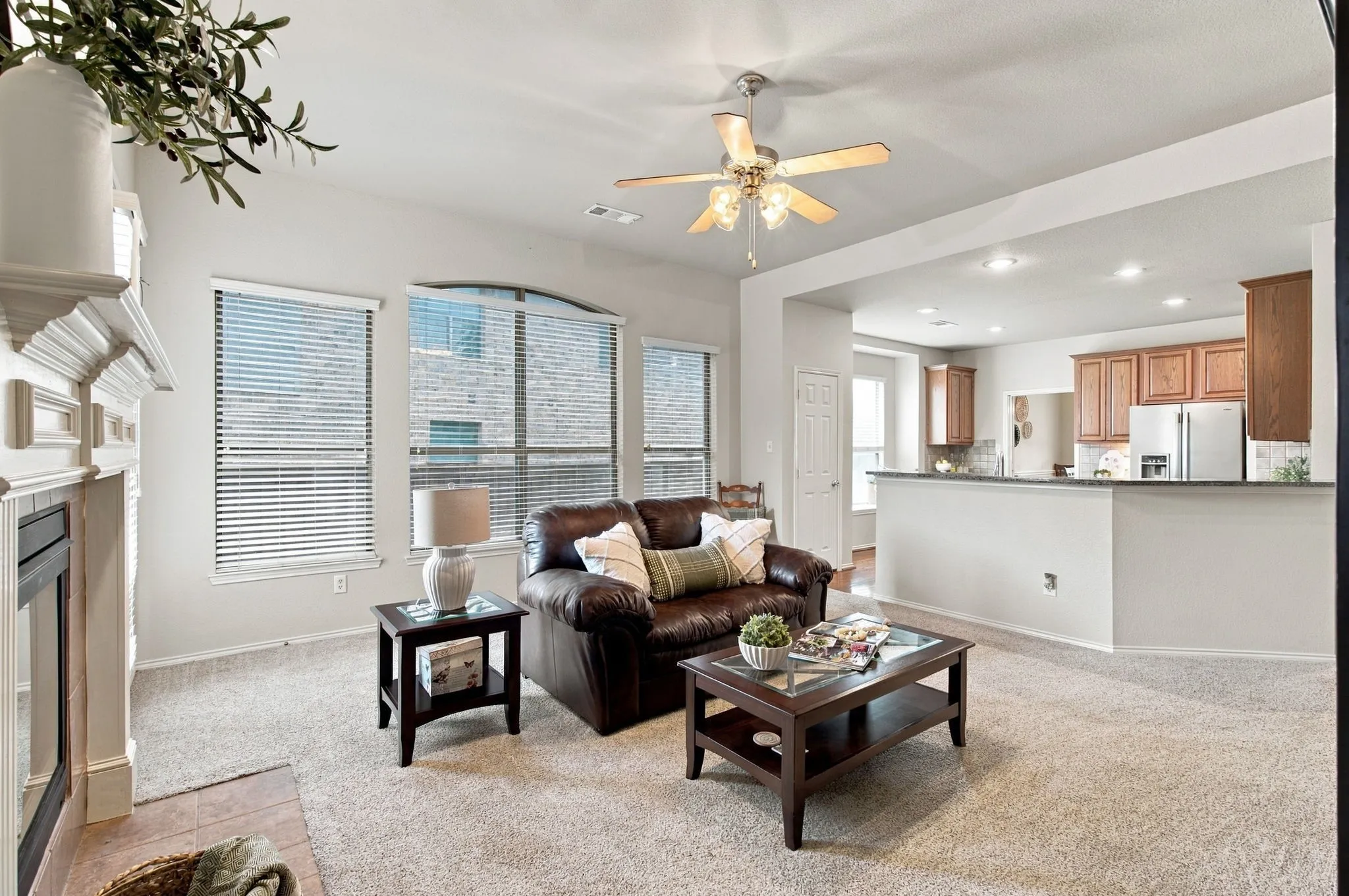 Open Living room with bar top to kitchen