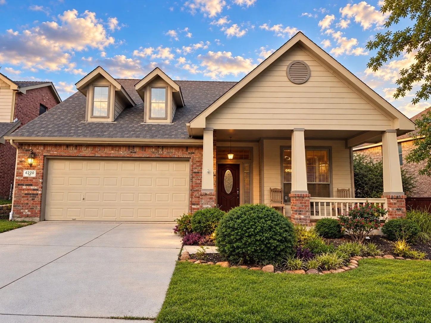 Craftsman Style with large covered front porch. Plenty of room for a table and chairs or a large porch swing!