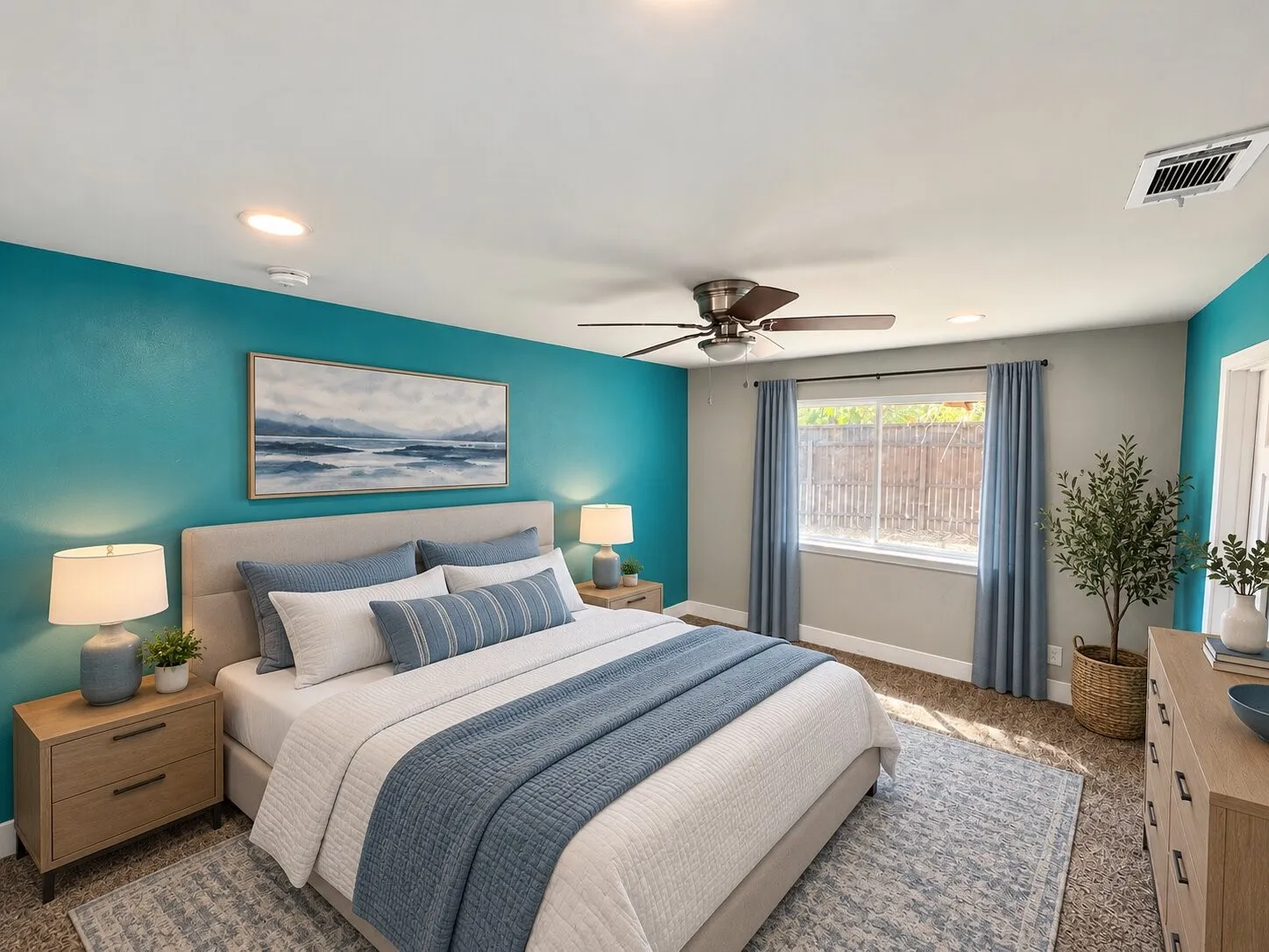 Virtually staged -
Recessed lighting, ceiling fan, window with privacy fencing, and carpeted flooring