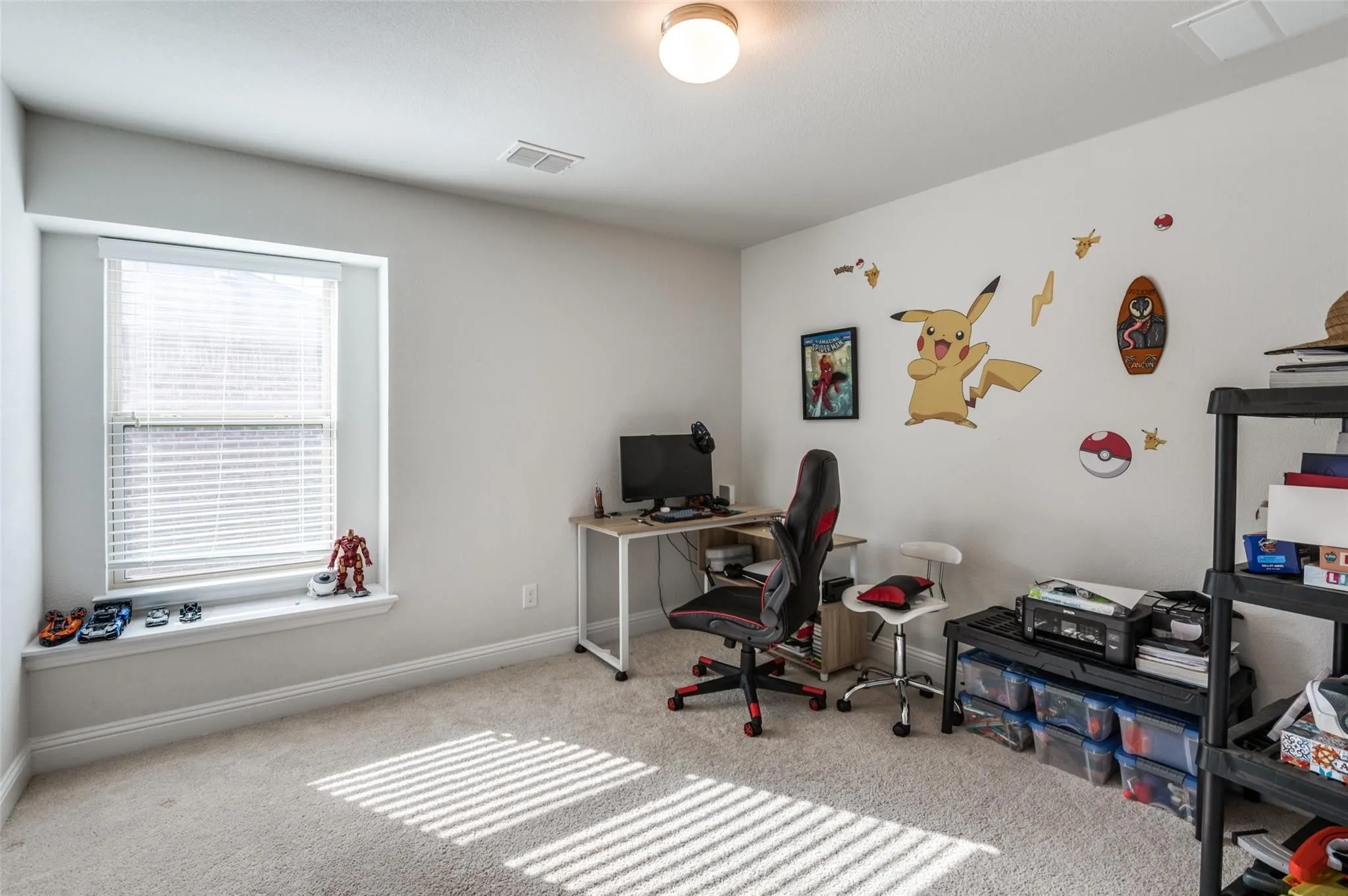 Recessed window with blinds, overhead flush mount lighting, and neutral carpeting