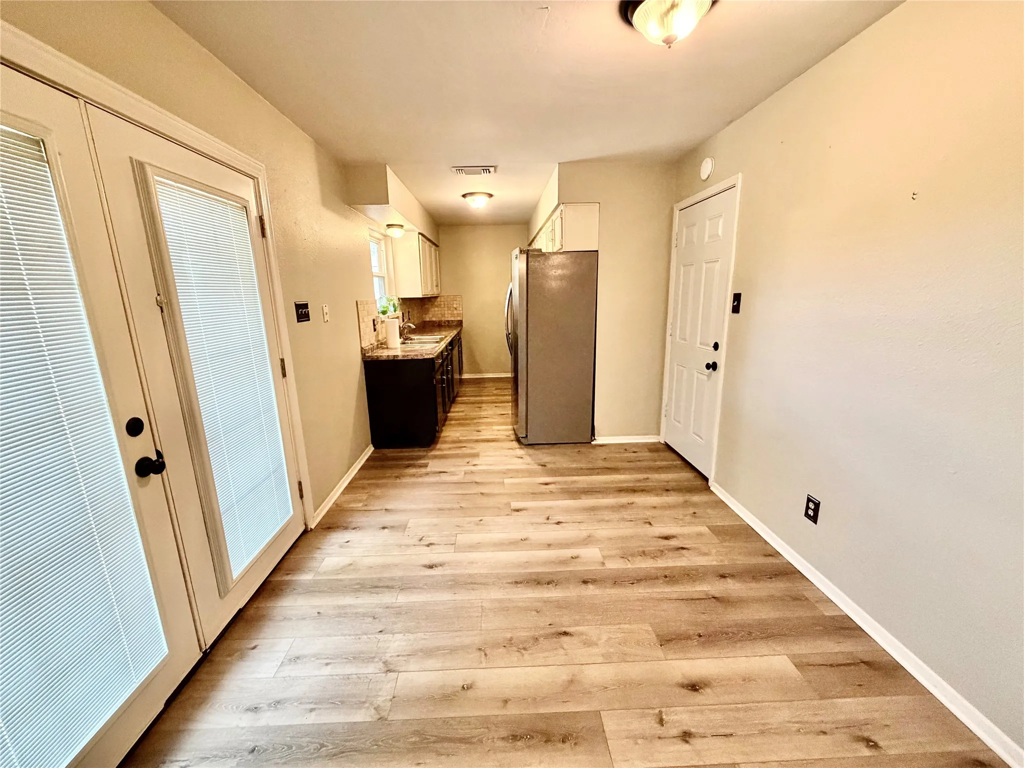Breakfast Area into Kitchen