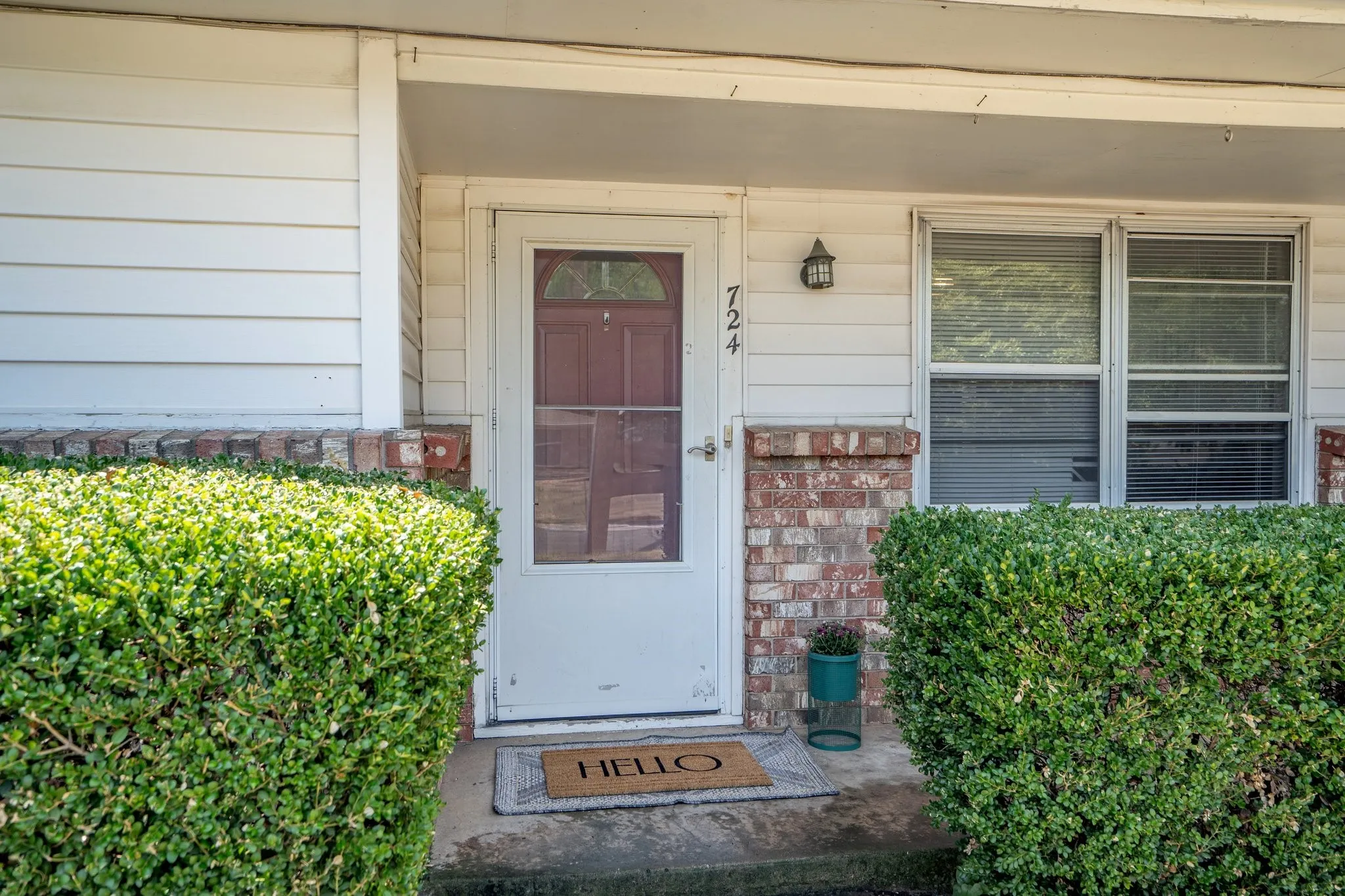 Property entrance featuring covered porch