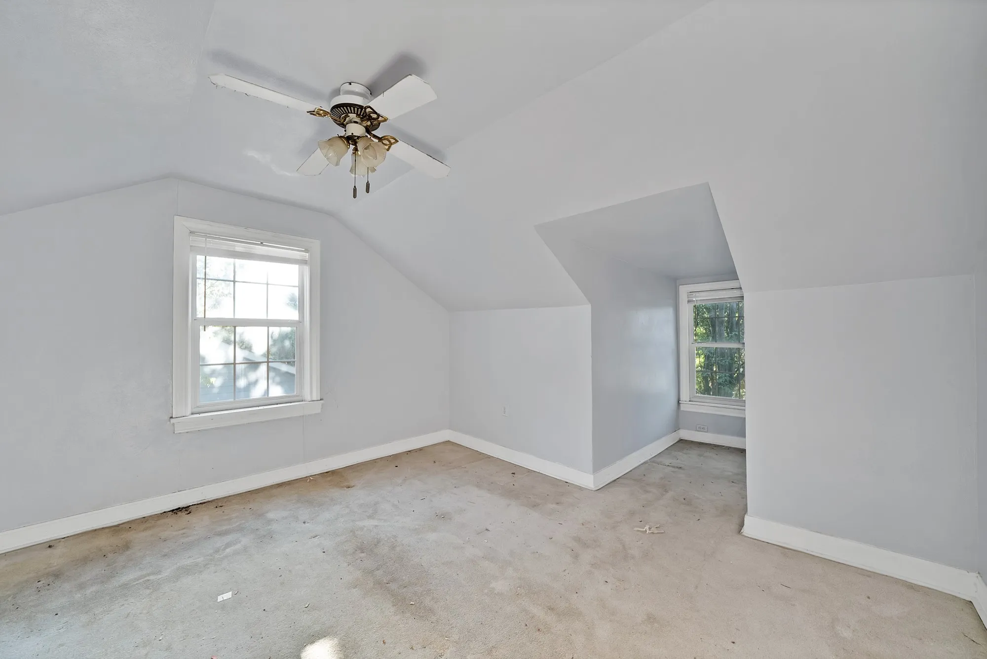 Sloped ceilings with a ceiling fan light fixture