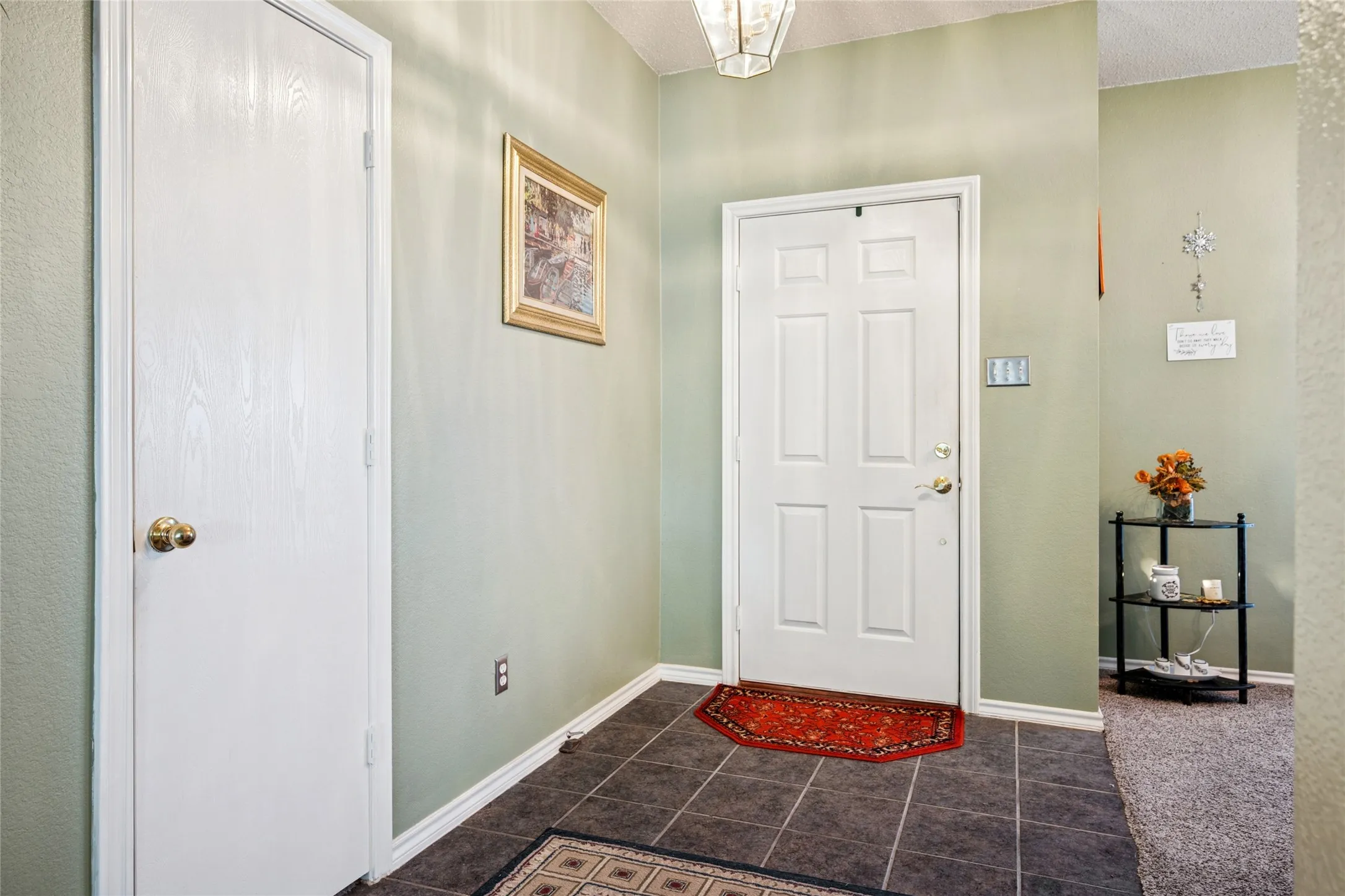 Tiled flooring entrance way.